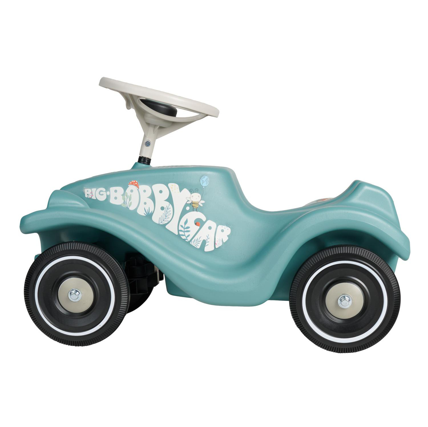 Ein türkisfarbener Bobby-Car-Roller mit weißem Lenkrad und Aufklebern.