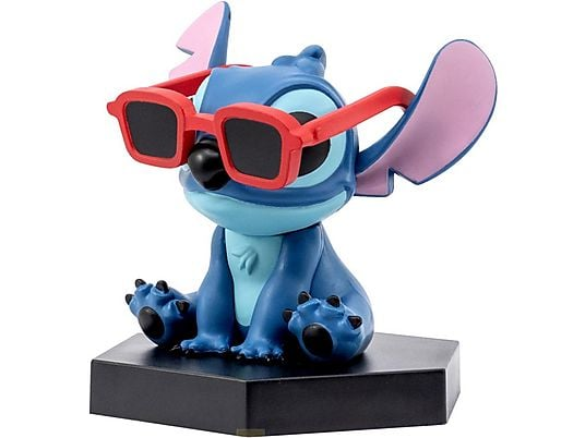 Una figura azul con gafas rojas se sienta sobre una base negra.