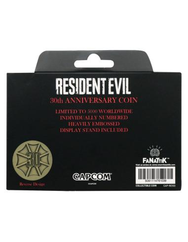 Embalaje de moneda del 30 aniversario de Resident Evil con emblema y logo Capcom.