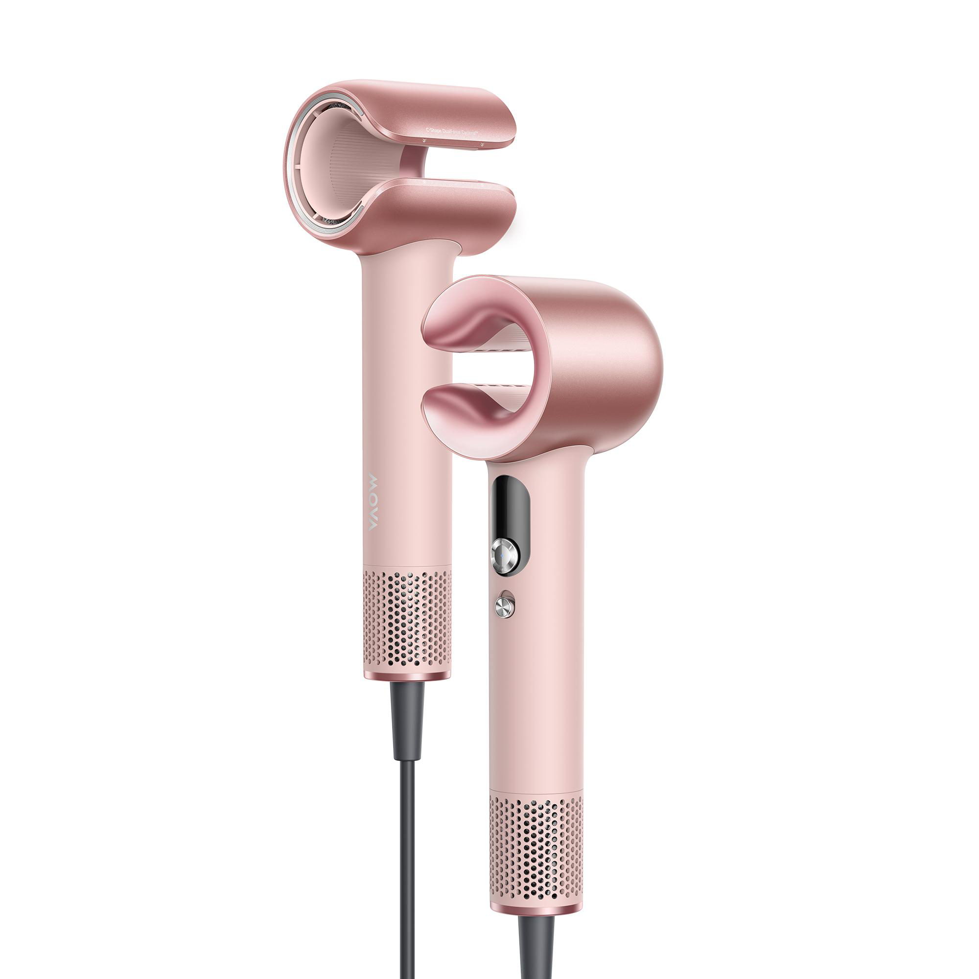 Zwei roségoldene Haartrockner mit C-förmigem Kopf und perforiertem Griff.