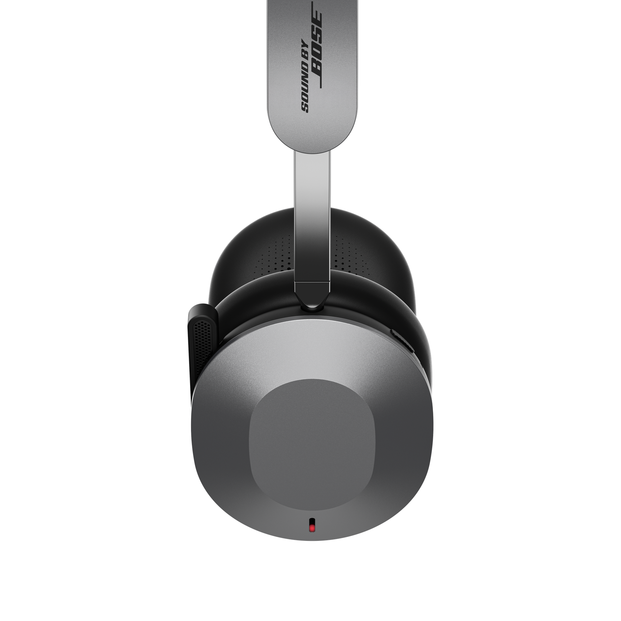 Auriculares Bose grises con LED rojo sobre fondo negro.