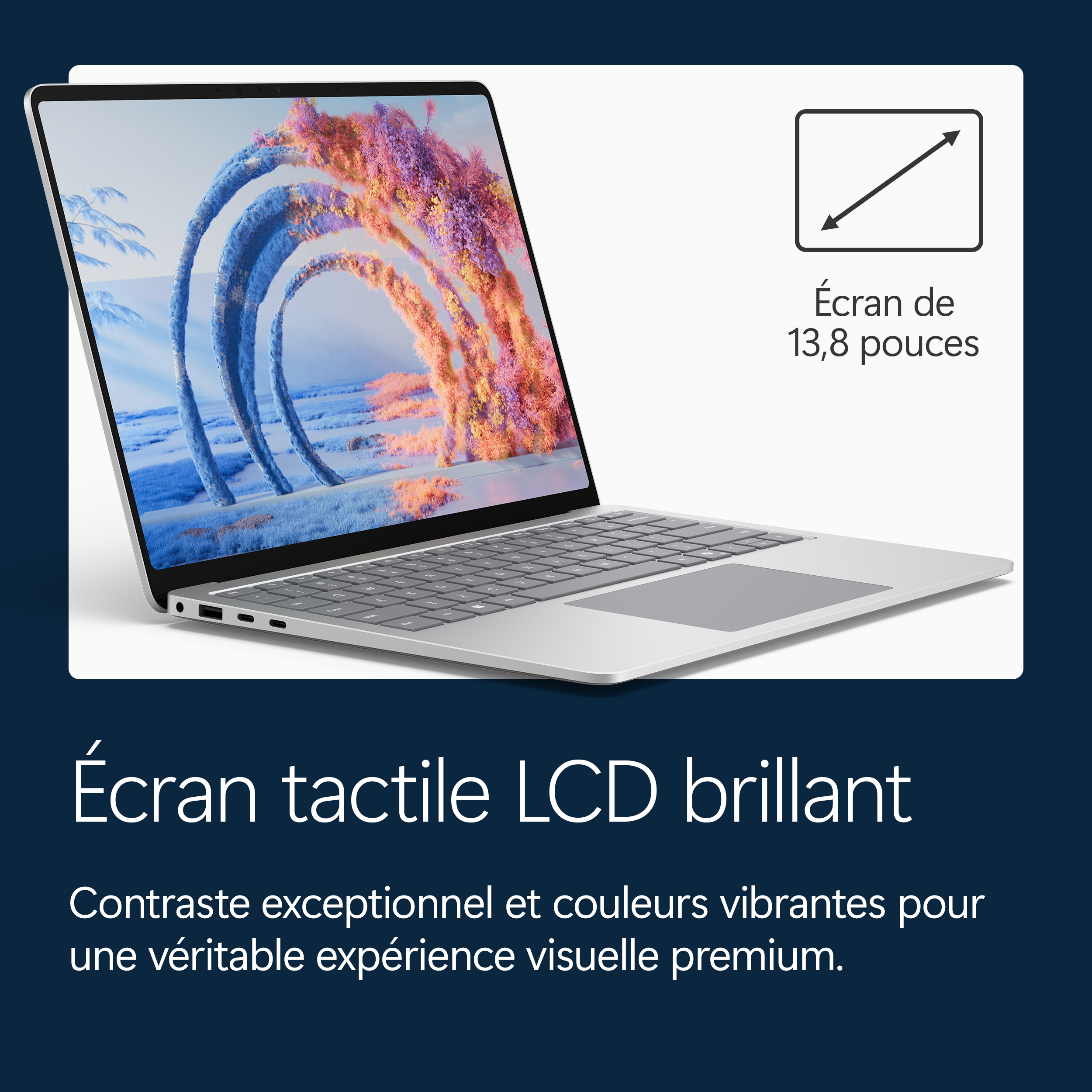 Un ordinateur portable argenté avec écran tactile de 13,8 pouces affichant une image abstraite.