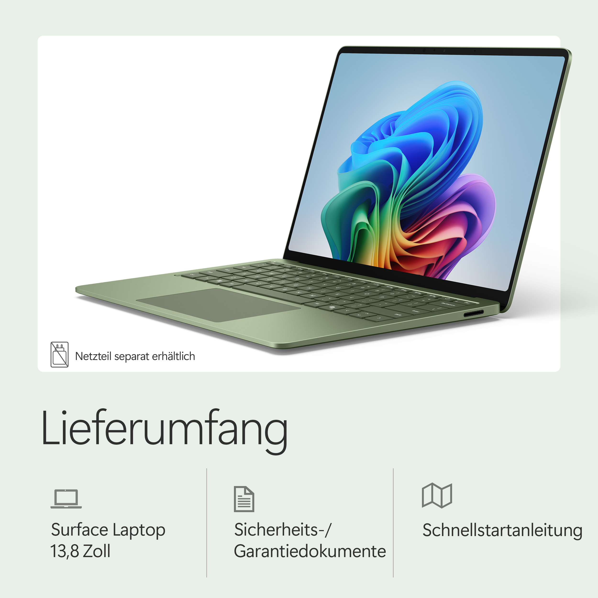 Ein grüner Laptop mit einem bunten Hintergrund auf dem Bildschirm.