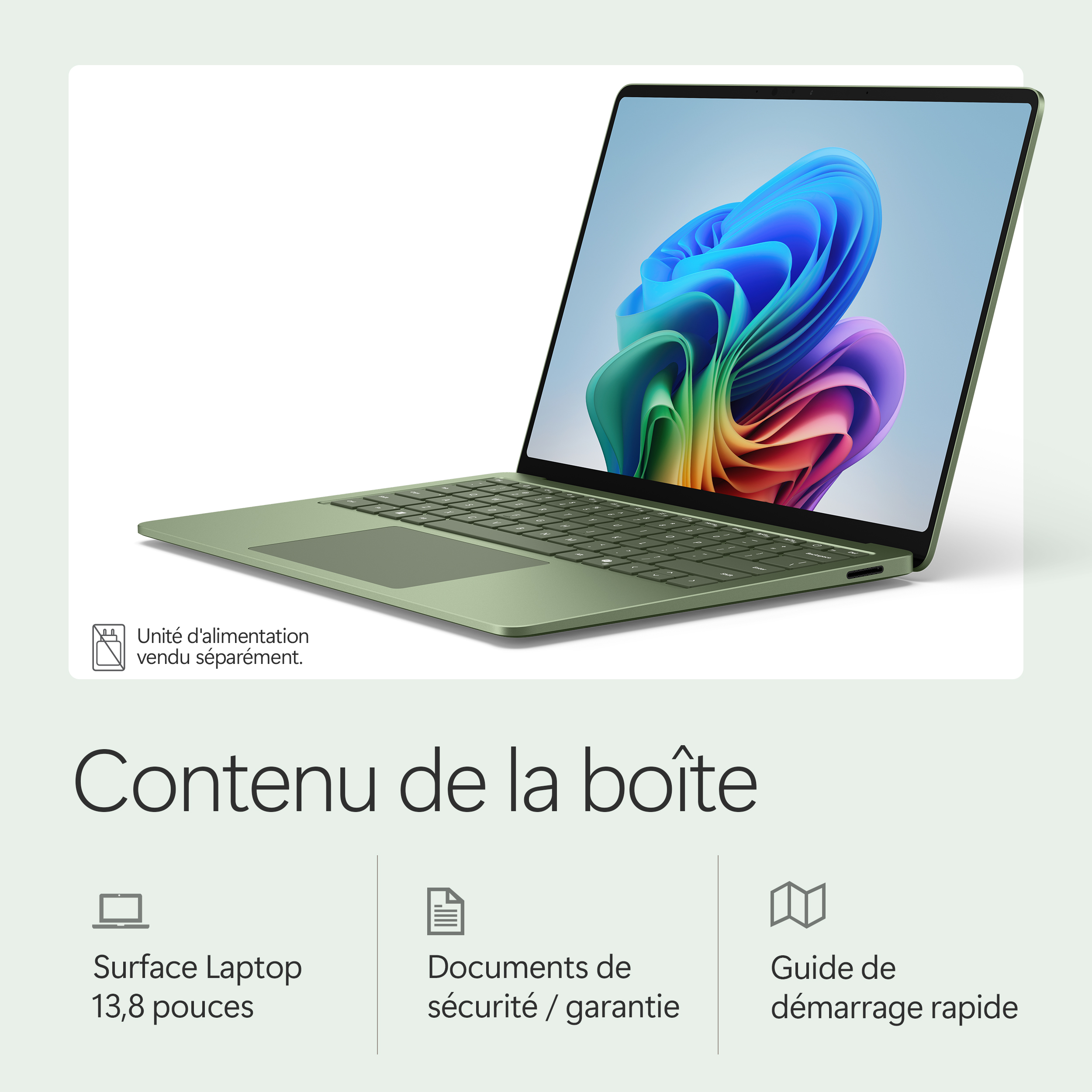 Un ordinateur portable vert avec un fond coloré sur son écran.