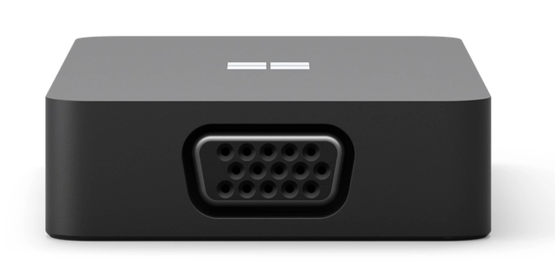 Ein schwarzer Adapter mit VGA-Anschluss und Microsoft-Logo.
