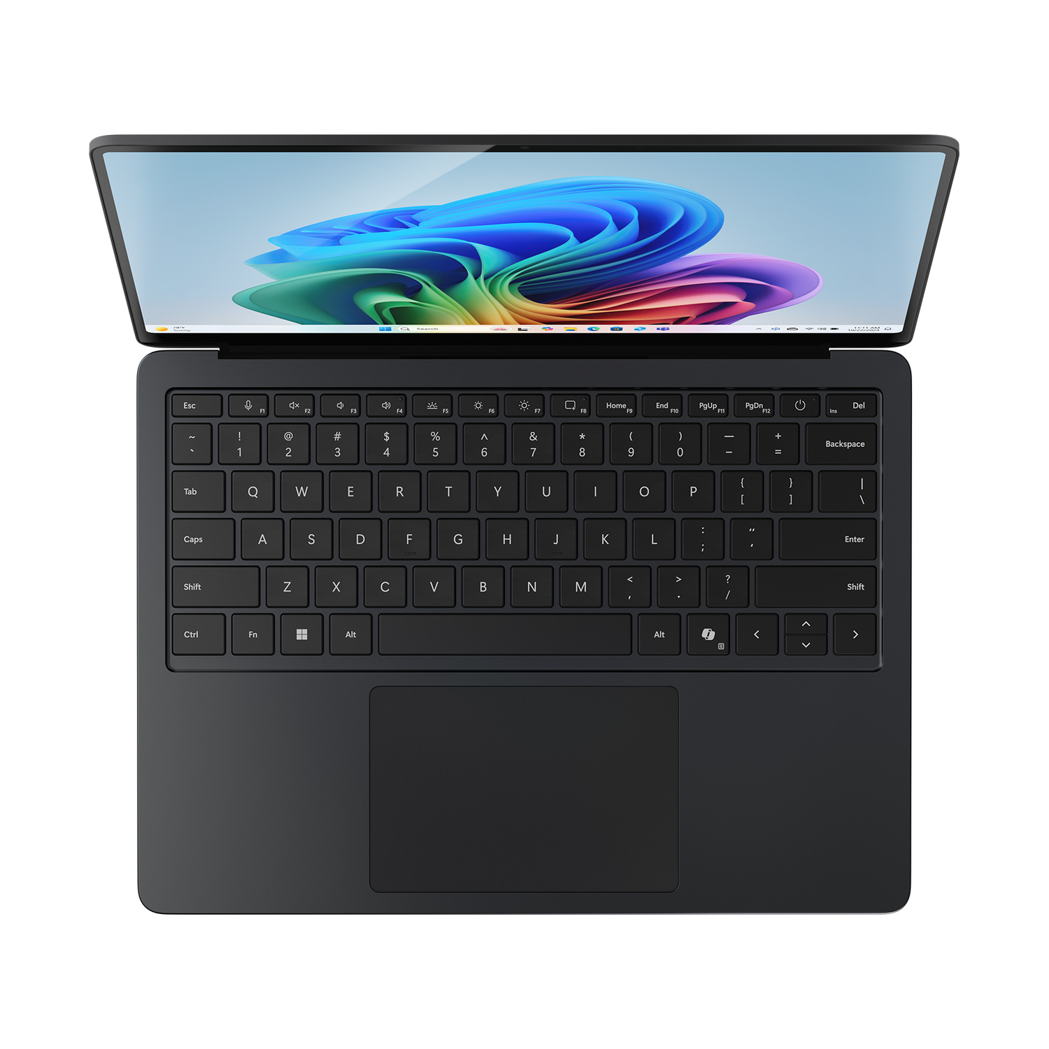 Un laptop nero aperto mostra uno sfondo colorato. Tastiera e trackpad sono visibili.