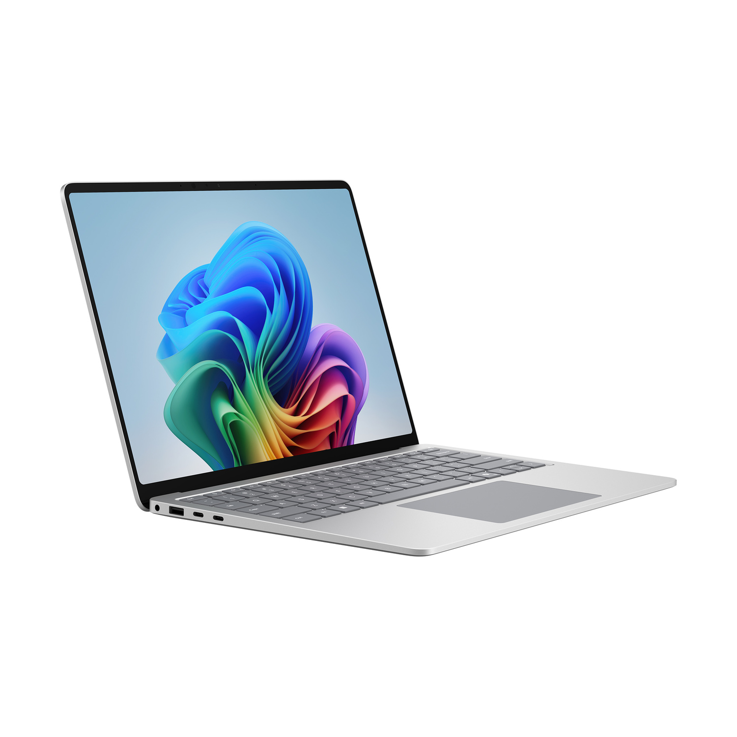 Un laptop argentato con uno sfondo colorato sullo schermo.