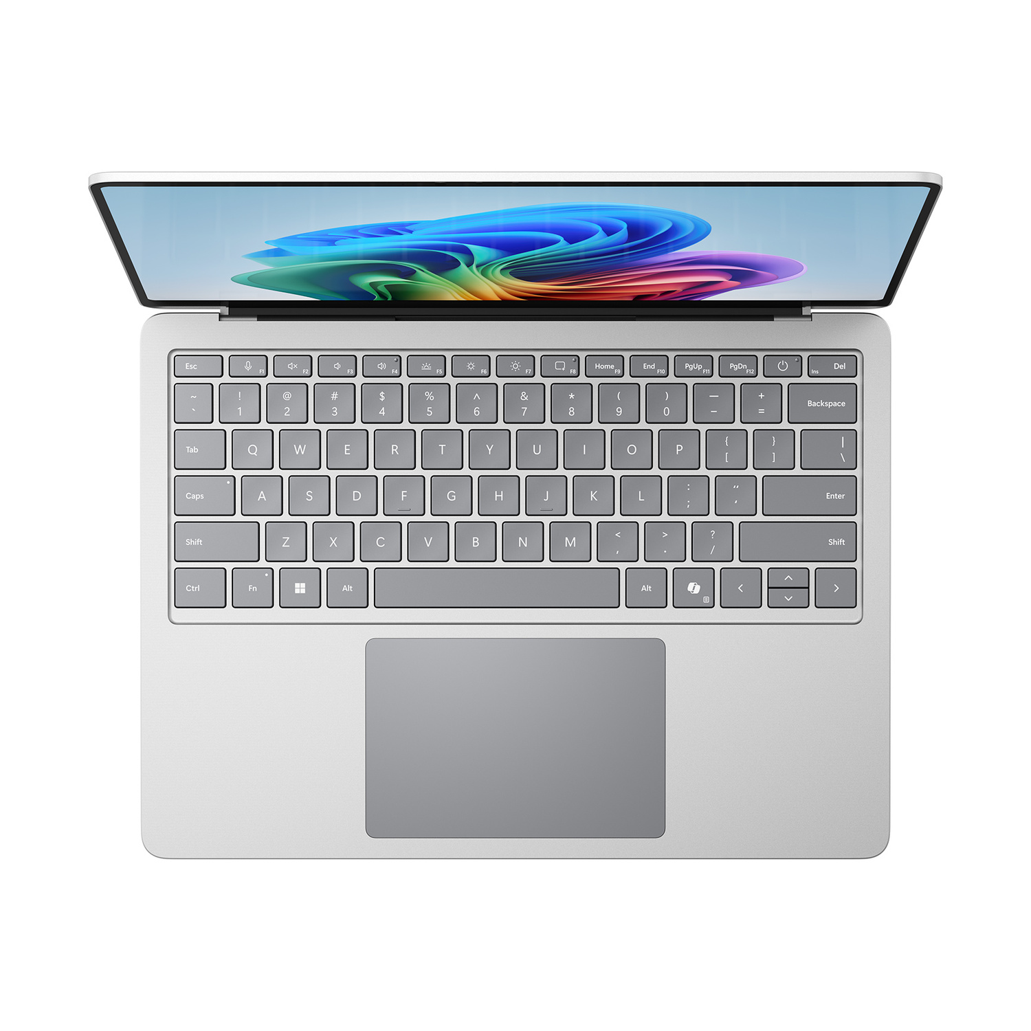 Un laptop argentato aperto con uno sfondo colorato visualizzato sullo schermo.