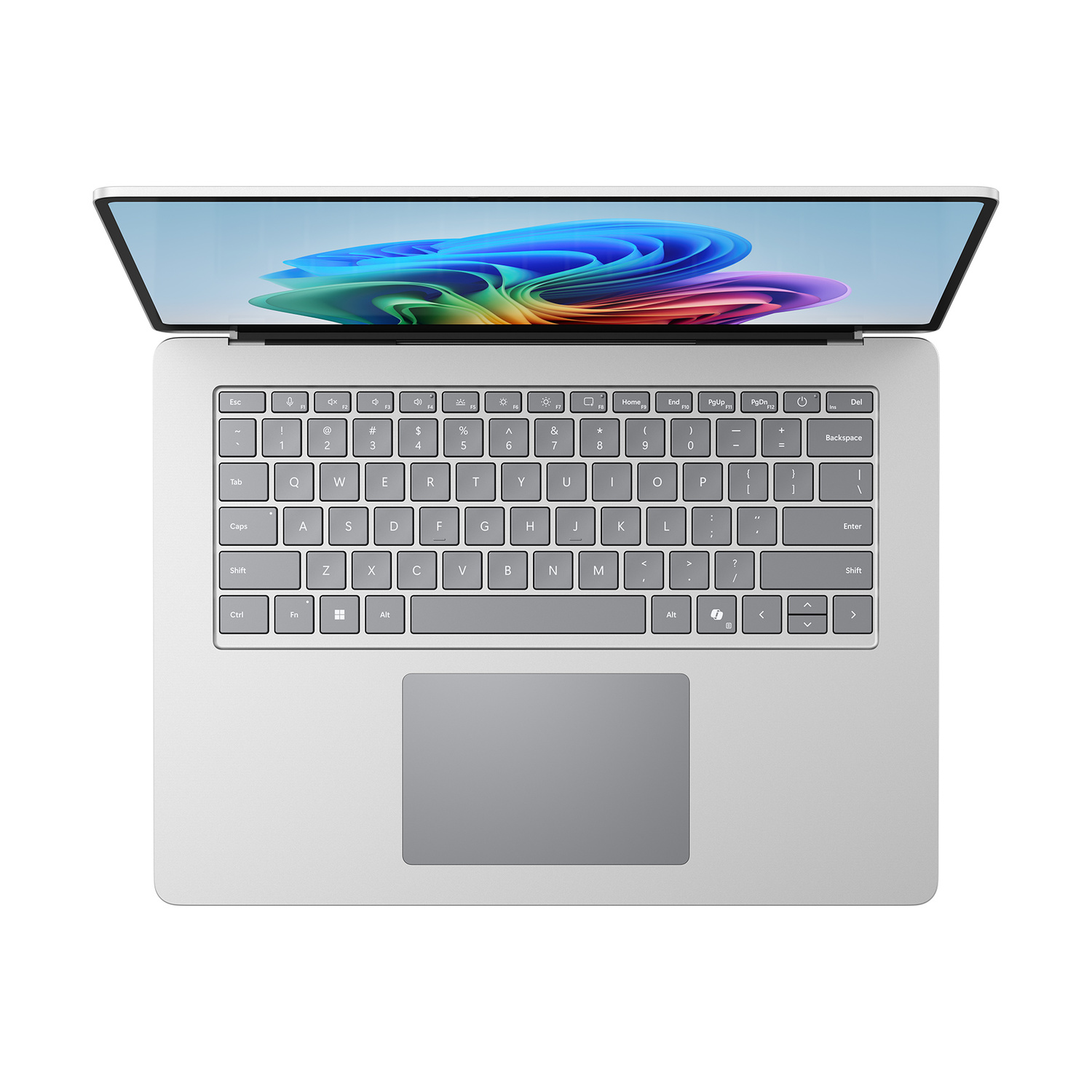 Un laptop argentato con lo schermo aperto, che mostra un'immagine astratta colorata.