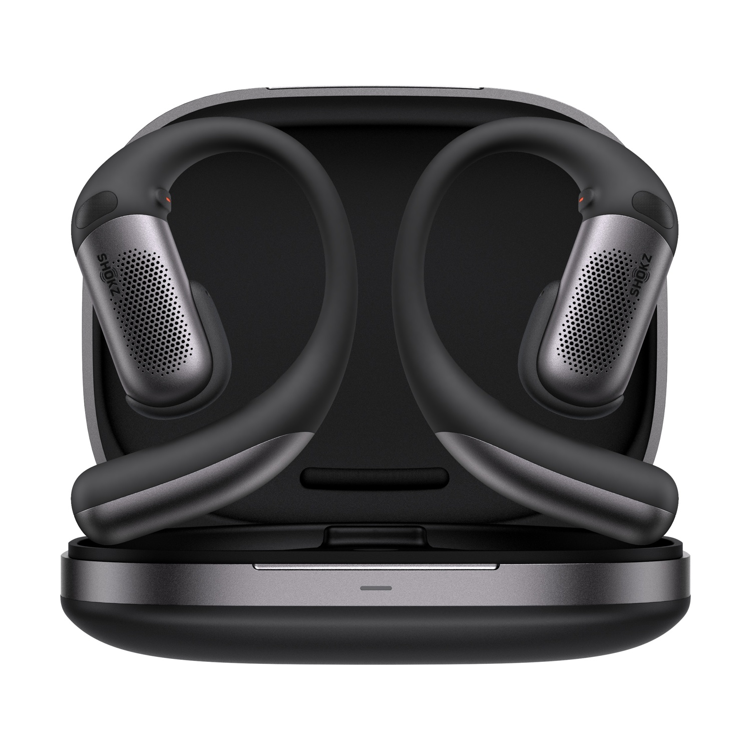 Cuffie nere a orecchio aperto con ganci per l'orecchio nella custodia di ricarica.