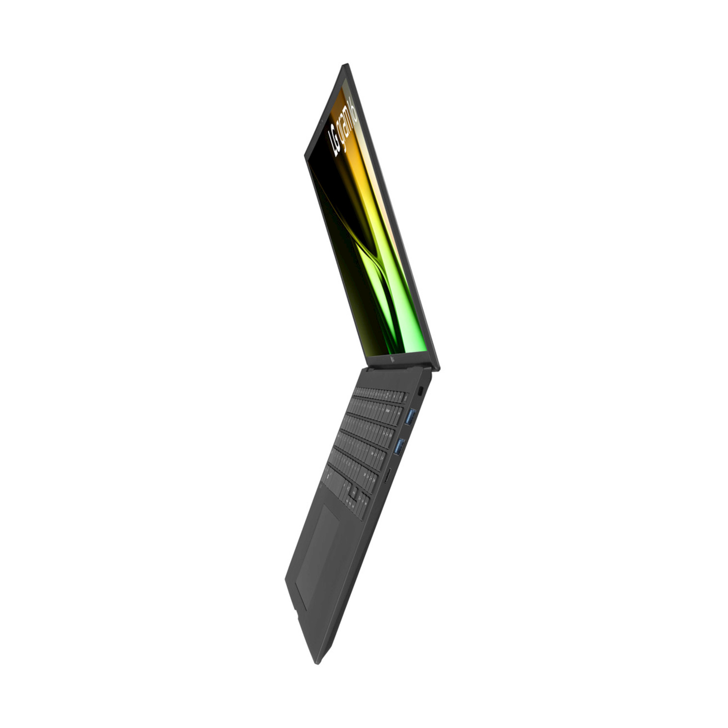 Un laptop LG Gram grigio scuro è angolato, mostrando la tastiera e lo schermo con colori astratti.