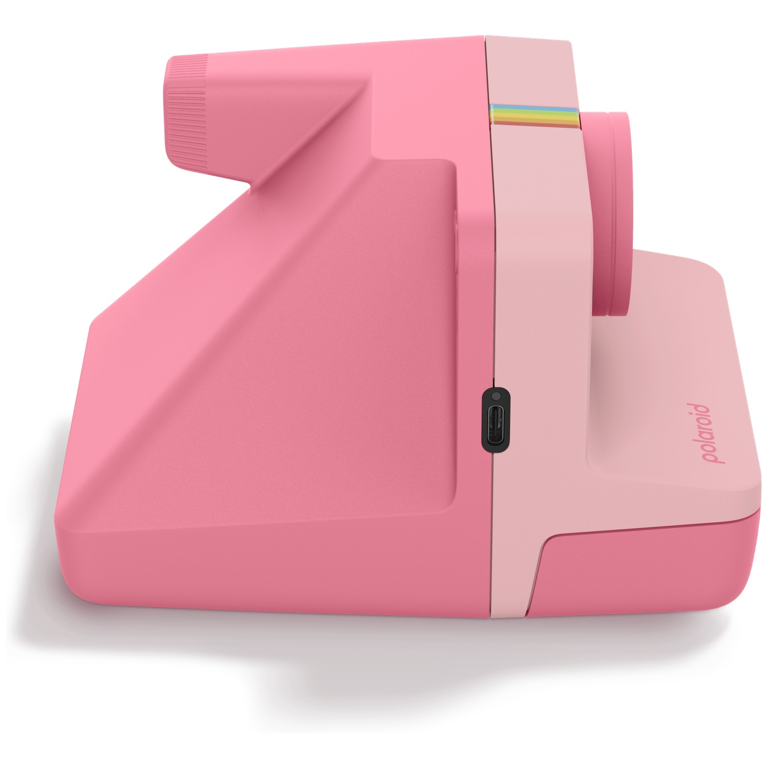 Roze Polaroid camera met regenboogstreep detail en USB-poort.