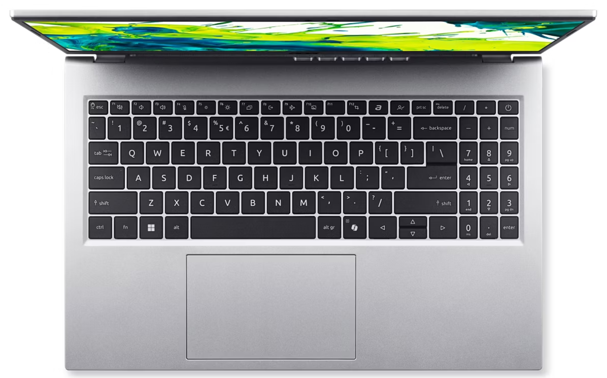 Ezüst laptop nyitott fedéllel, billentyűzet felülnézetből.