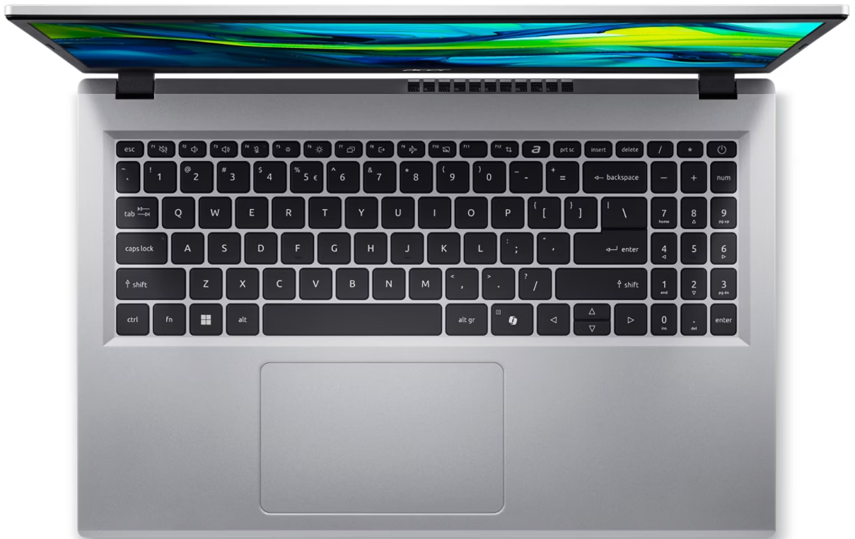 Egy nyitott ezüst laptop billentyűzettel és érintőpaddal.