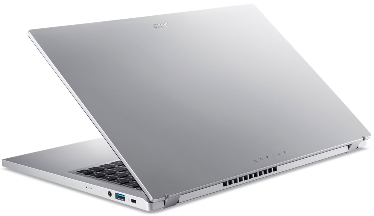 Ezüst Acer laptop nyitott fedéllel, billentyűzet látható.