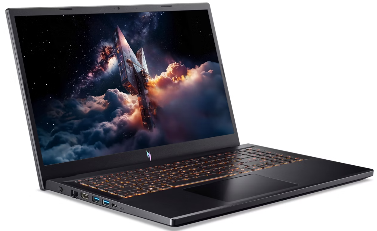 Fekete laptop világító billentyűzettel és űrtémájú háttérképpel.