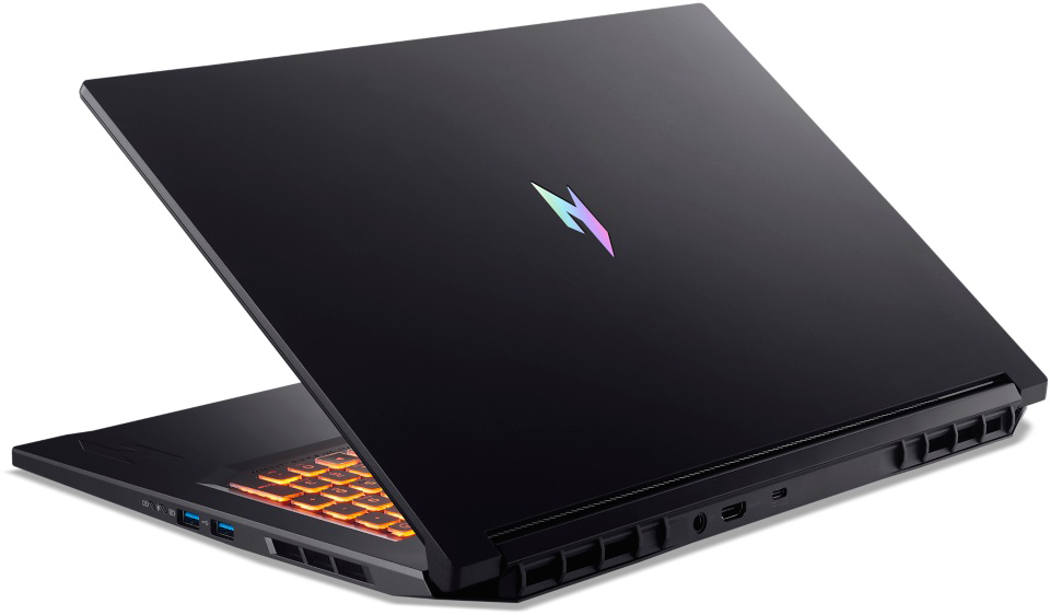 Fekete laptop világító billentyűzettel és logóval a fedélen.