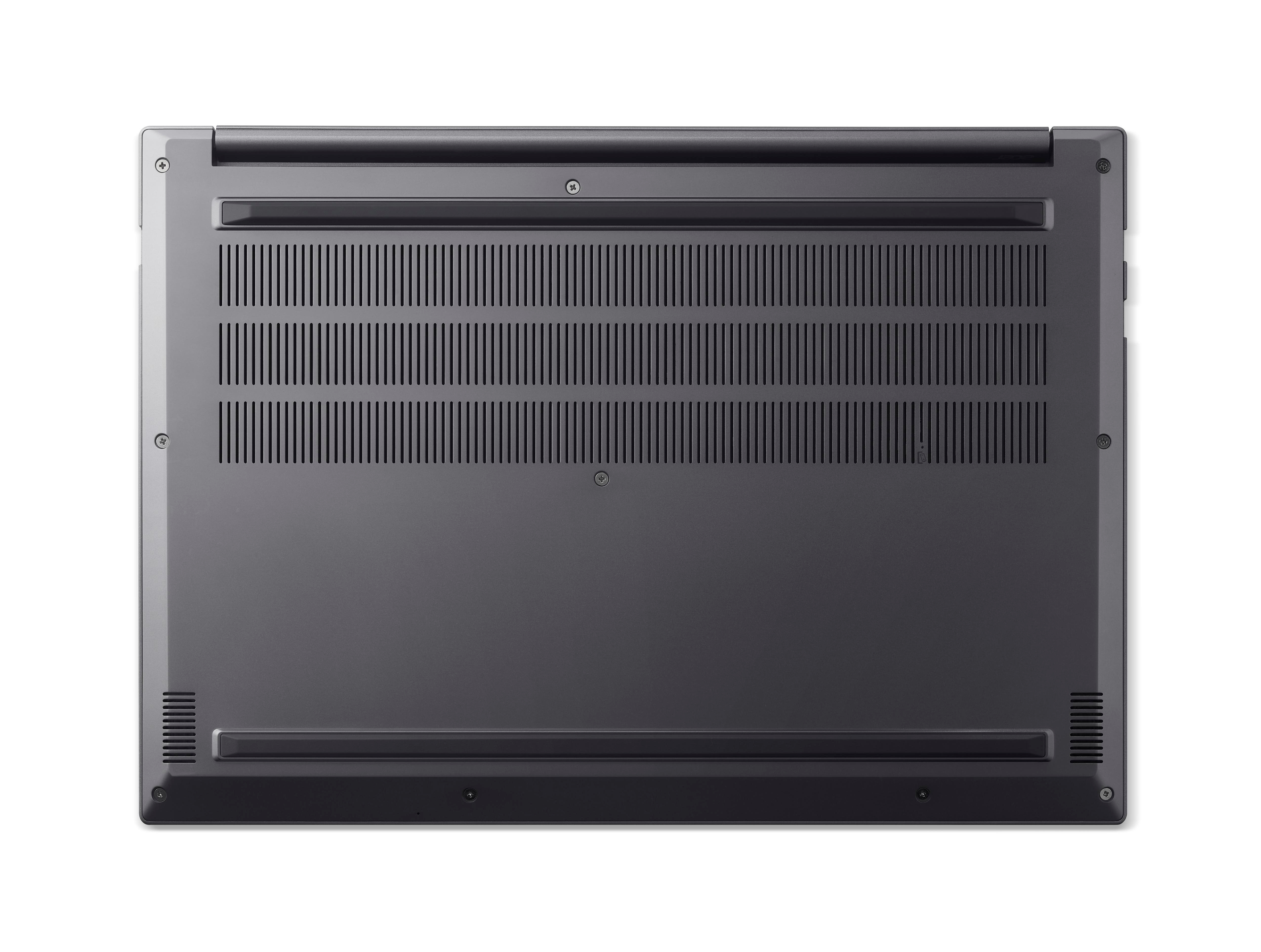 Unterseite eines geschlossenen grauen Laptops mit Lüftungsschlitzen und Schrauben.