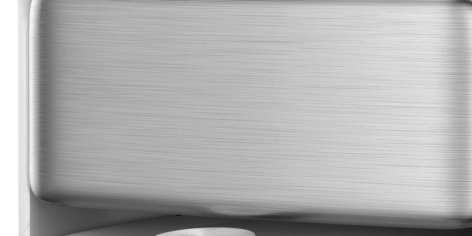 Primer plano de una superficie de metal cepillado con líneas horizontales.