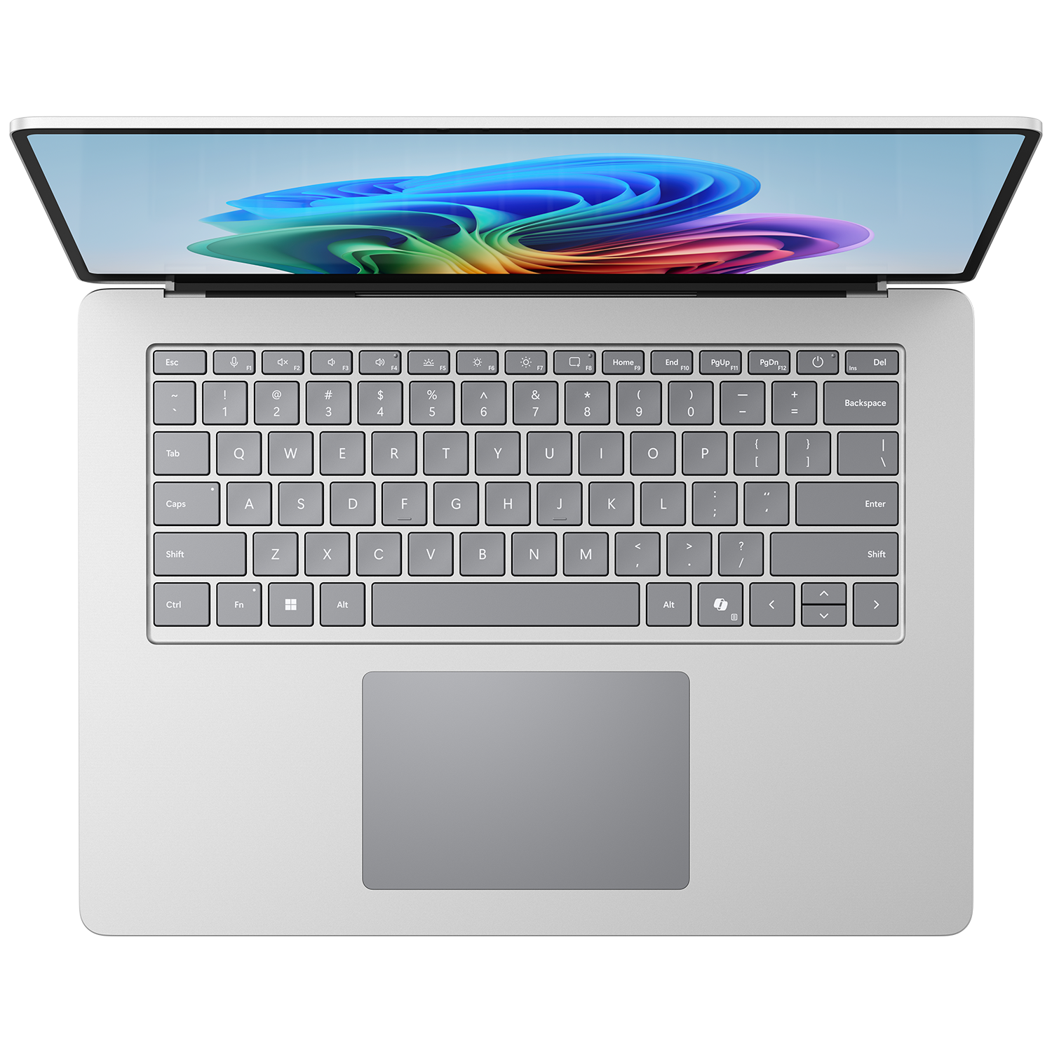 Silver laptop open, showing keyboard and colorful abstract wallpaper on screen.