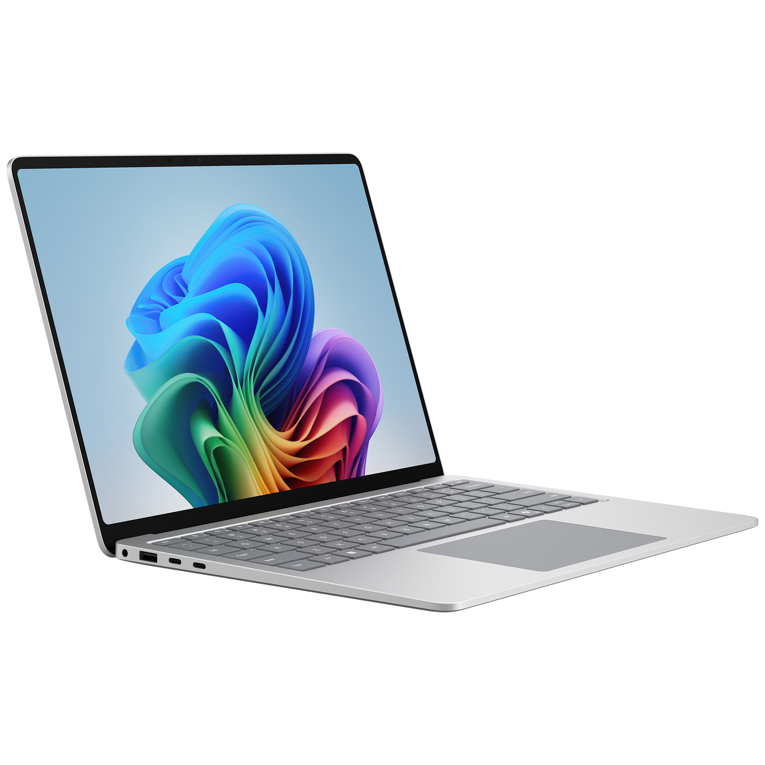 A silver laptop displaying a colorful abstract background on its screen.