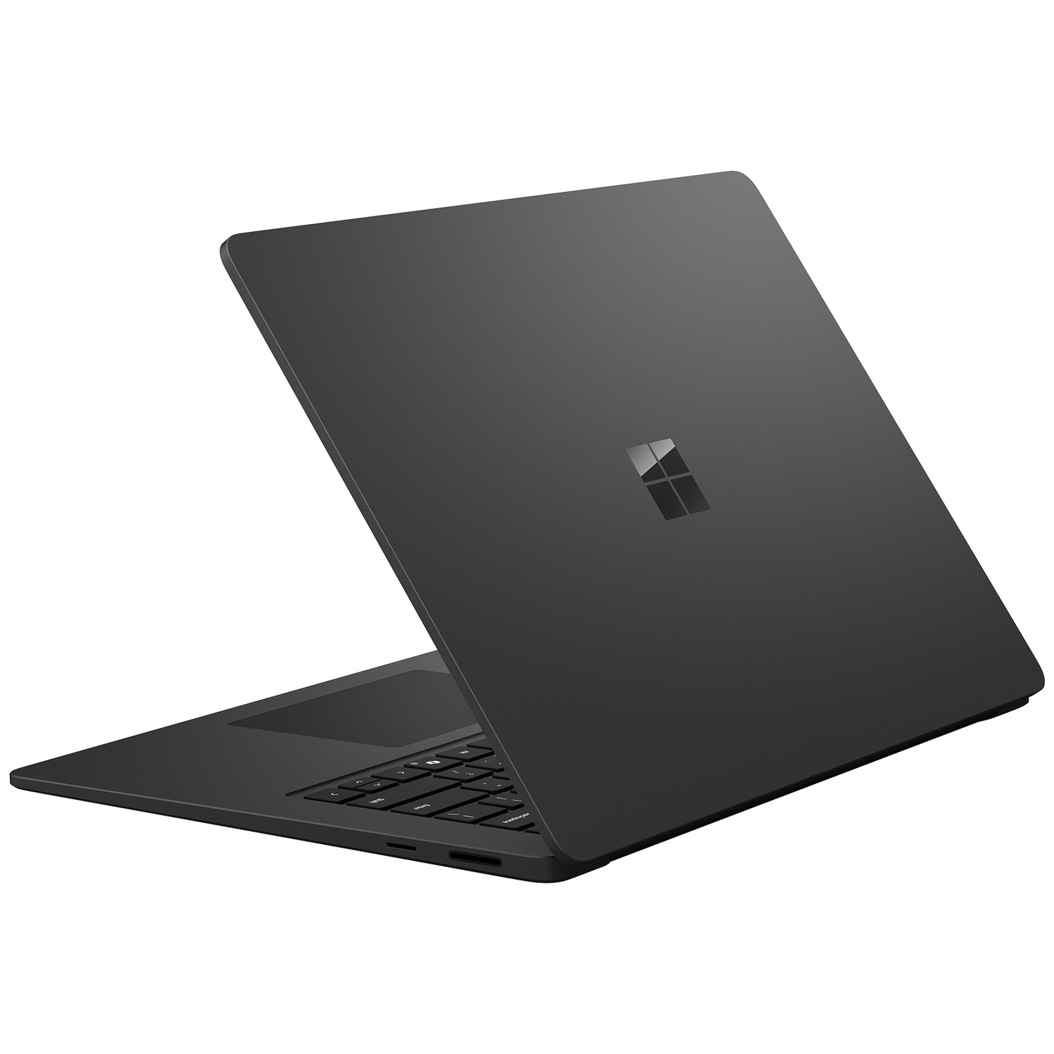 Een gesloten, donkere laptop met het Microsoft-logo op de klep.
