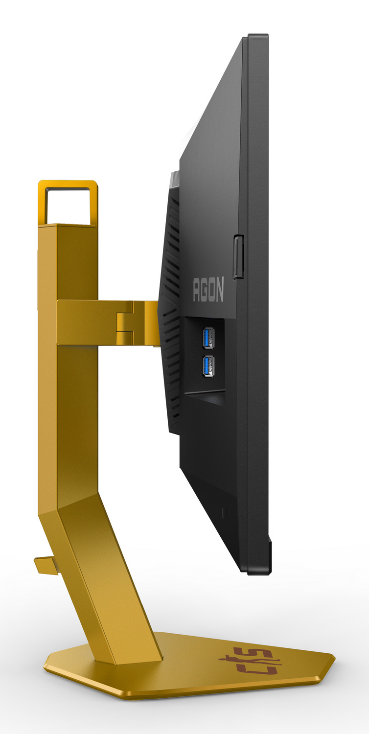 Un monitor negro con base dorada y dos puertos USB.