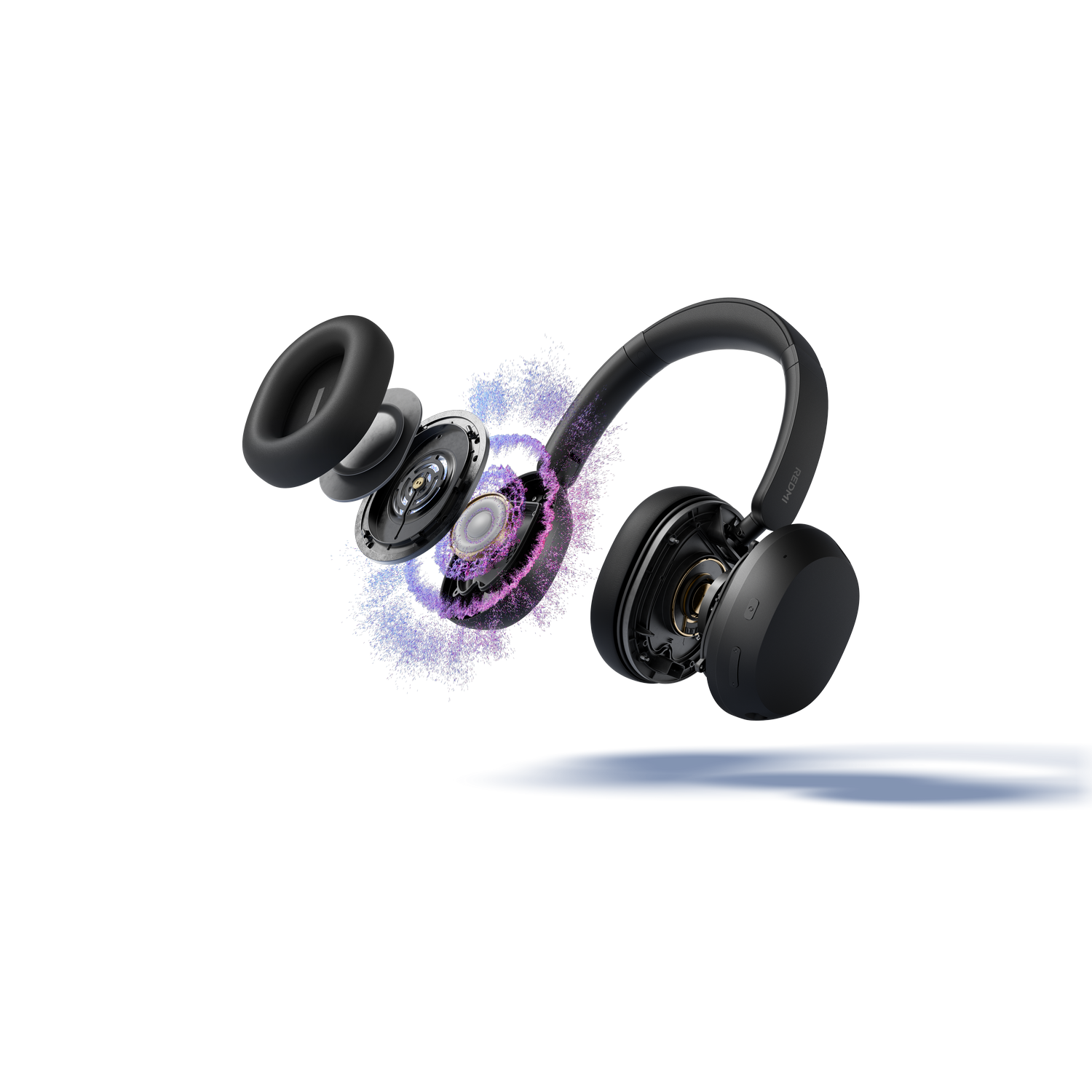 Vista explosionada de auriculares negros mostrando componentes internos y partículas púrpuras/azules.