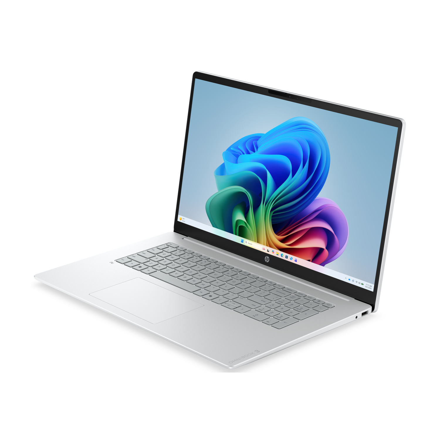 Un laptop HP argentato con uno sfondo astratto colorato sullo schermo.