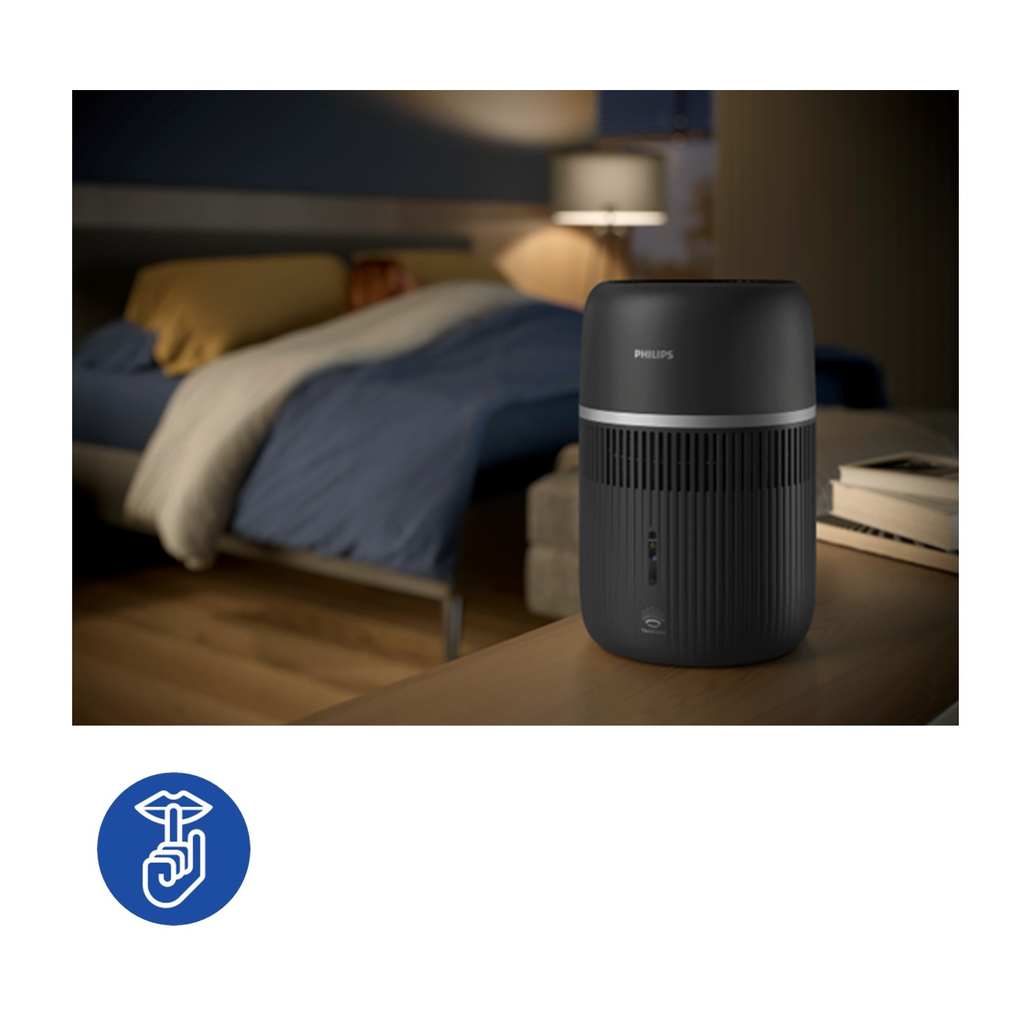 Un purificatore d'aria Philips nero è su un comodino accanto a un letto. Visibile anche un'icona di silenzio.