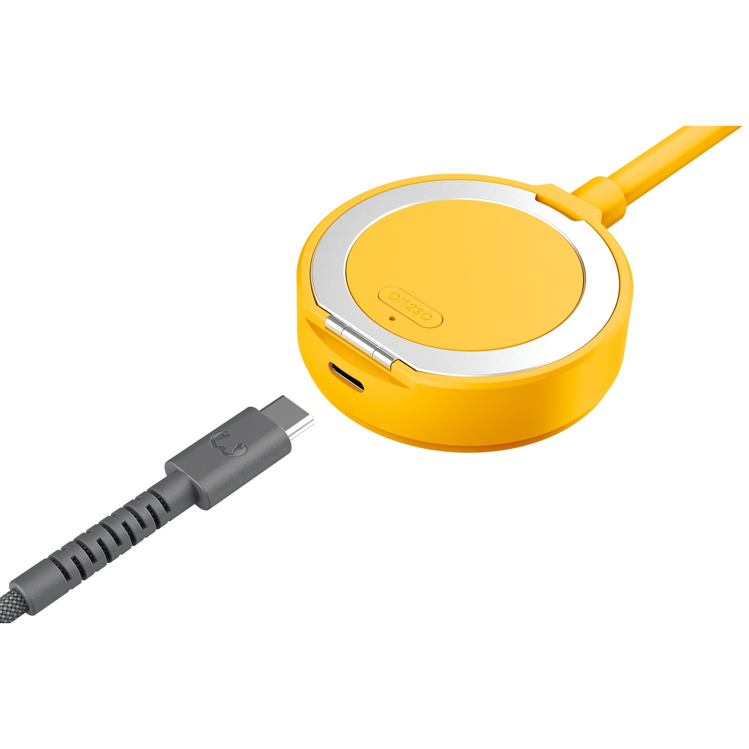 Een geel, rond apparaat met een grijze USB-C-kabel die wordt aangesloten.