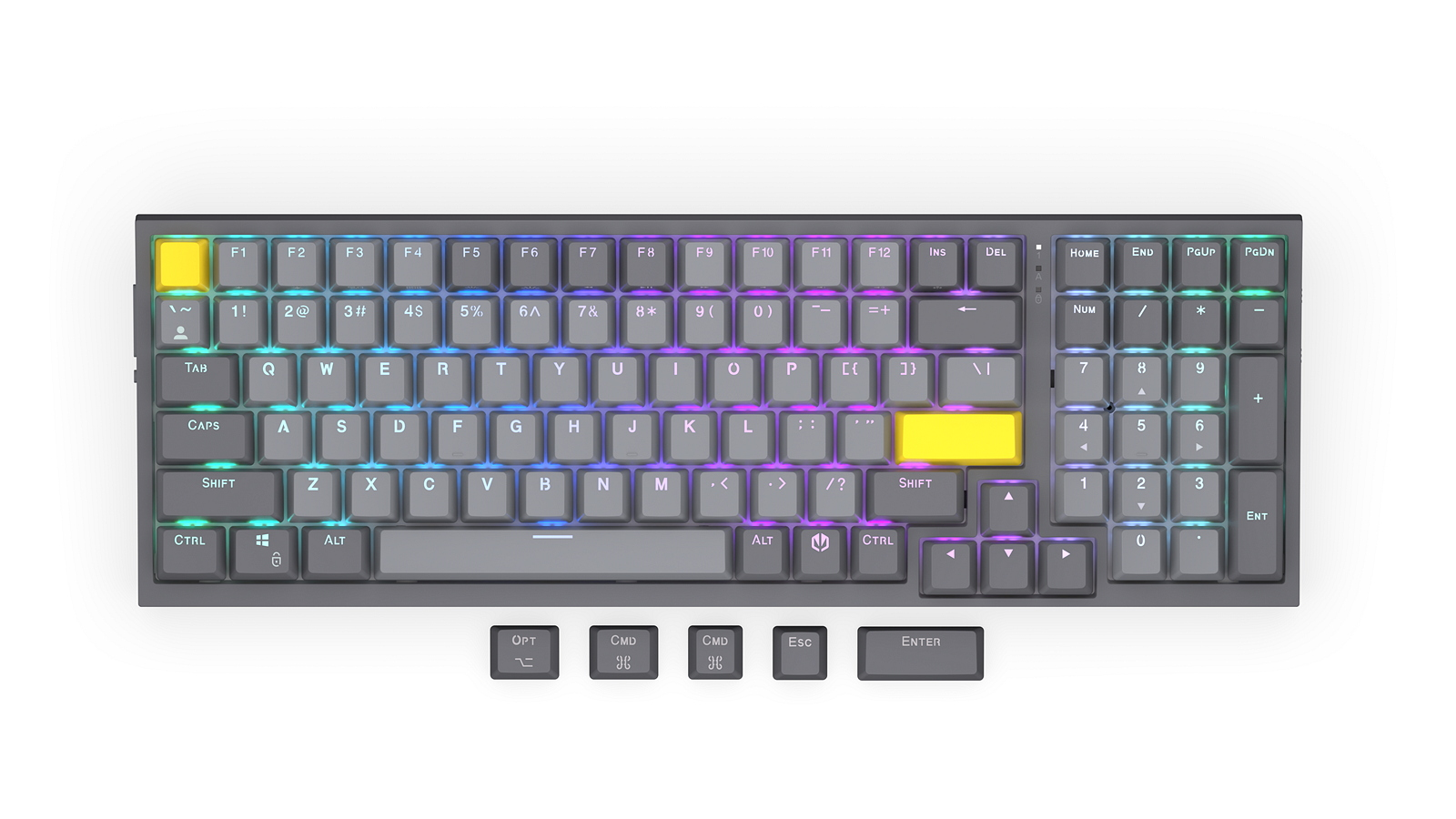 Szara klawiatura mechaniczna z podświetleniem RGB i żółtymi klawiszami akcentującymi. Niektóre nakładki są osobne.