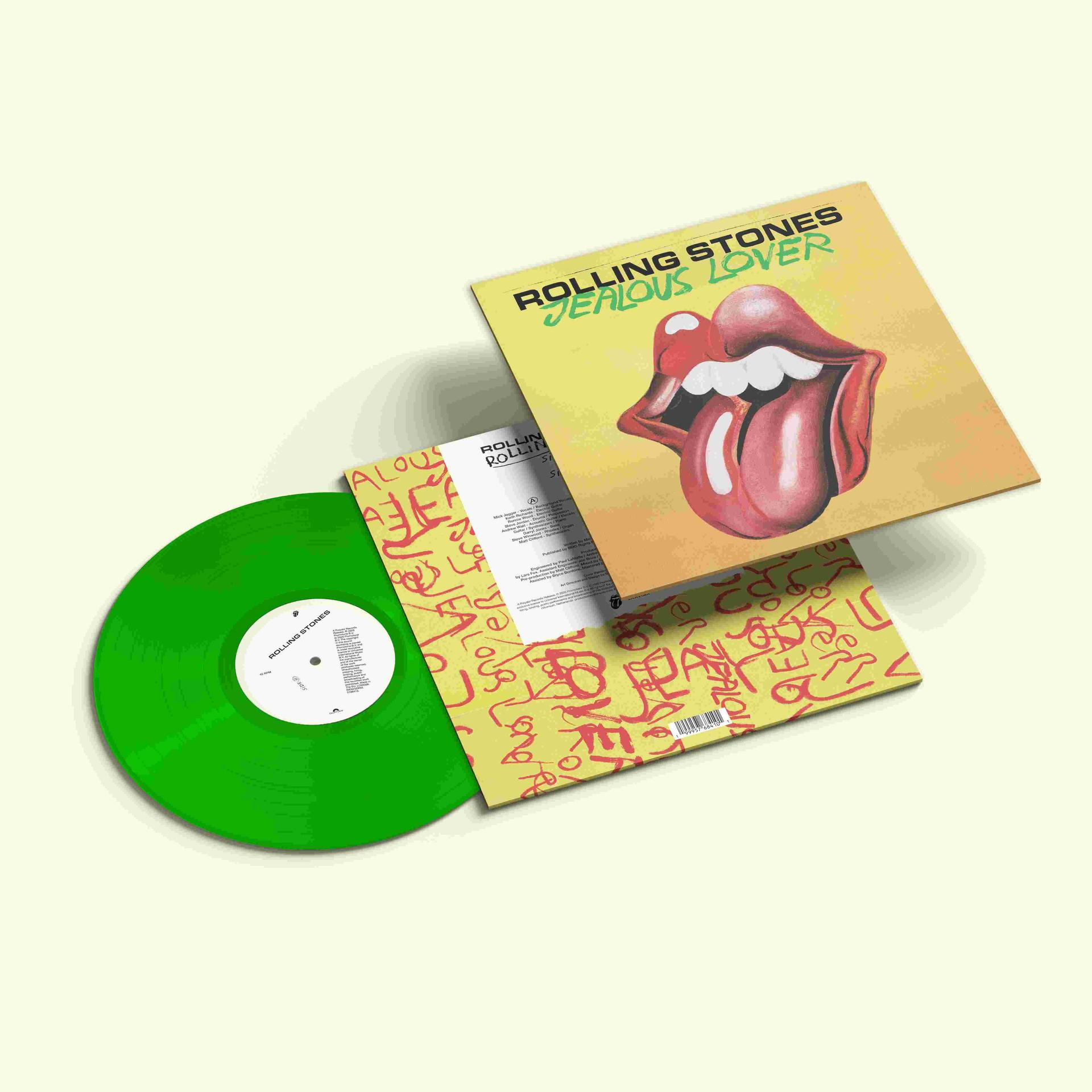 Grüne Schallplatte neben Albumcover mit Rolling Stones Logo und Zunge.