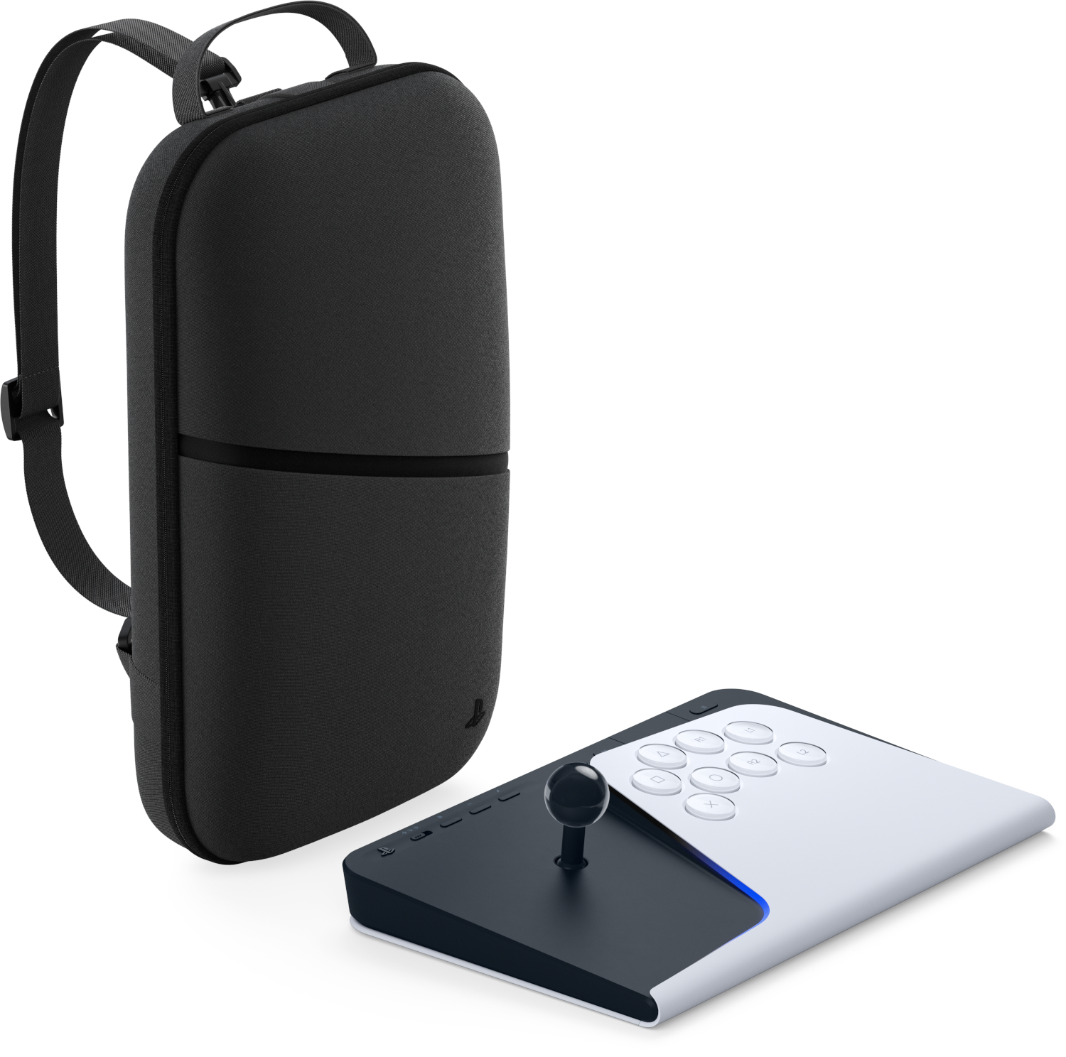 A black backpack and a white and black controller with a joystick.