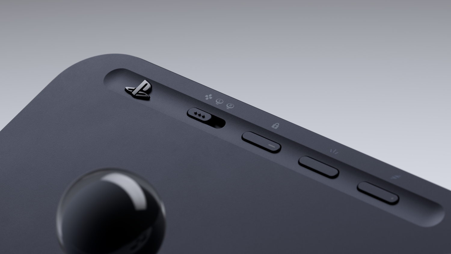Dark gray gamepad with PlayStation logo, joystick, and buttons.
