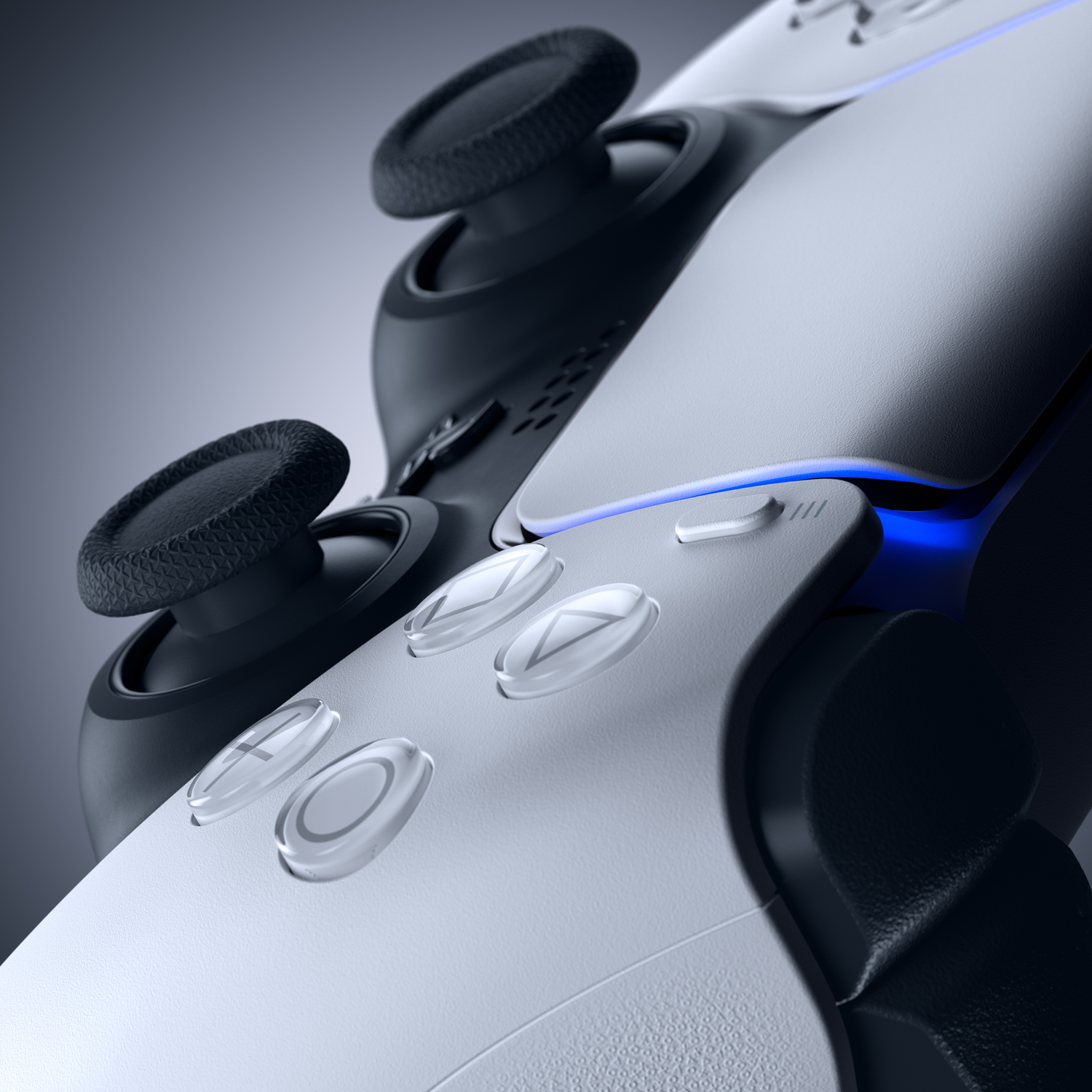 Een witte en zwarte controller met blauwe lichten. Close-up.