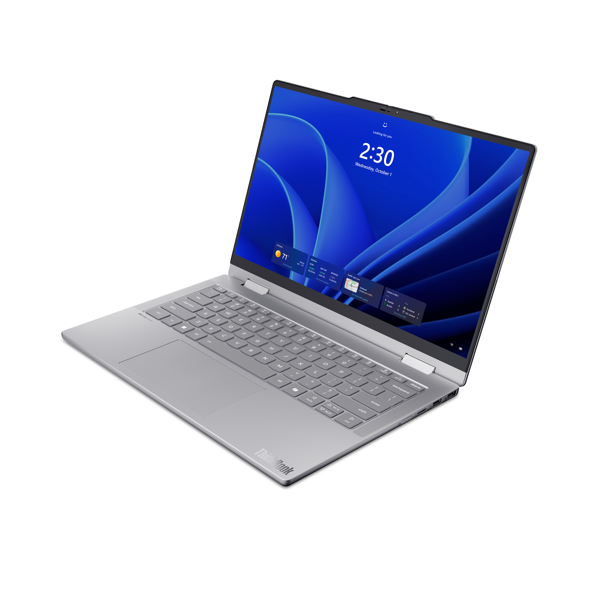 Ein silberner Laptop mit einem blauen Hintergrundbild und einer Tastatur.
