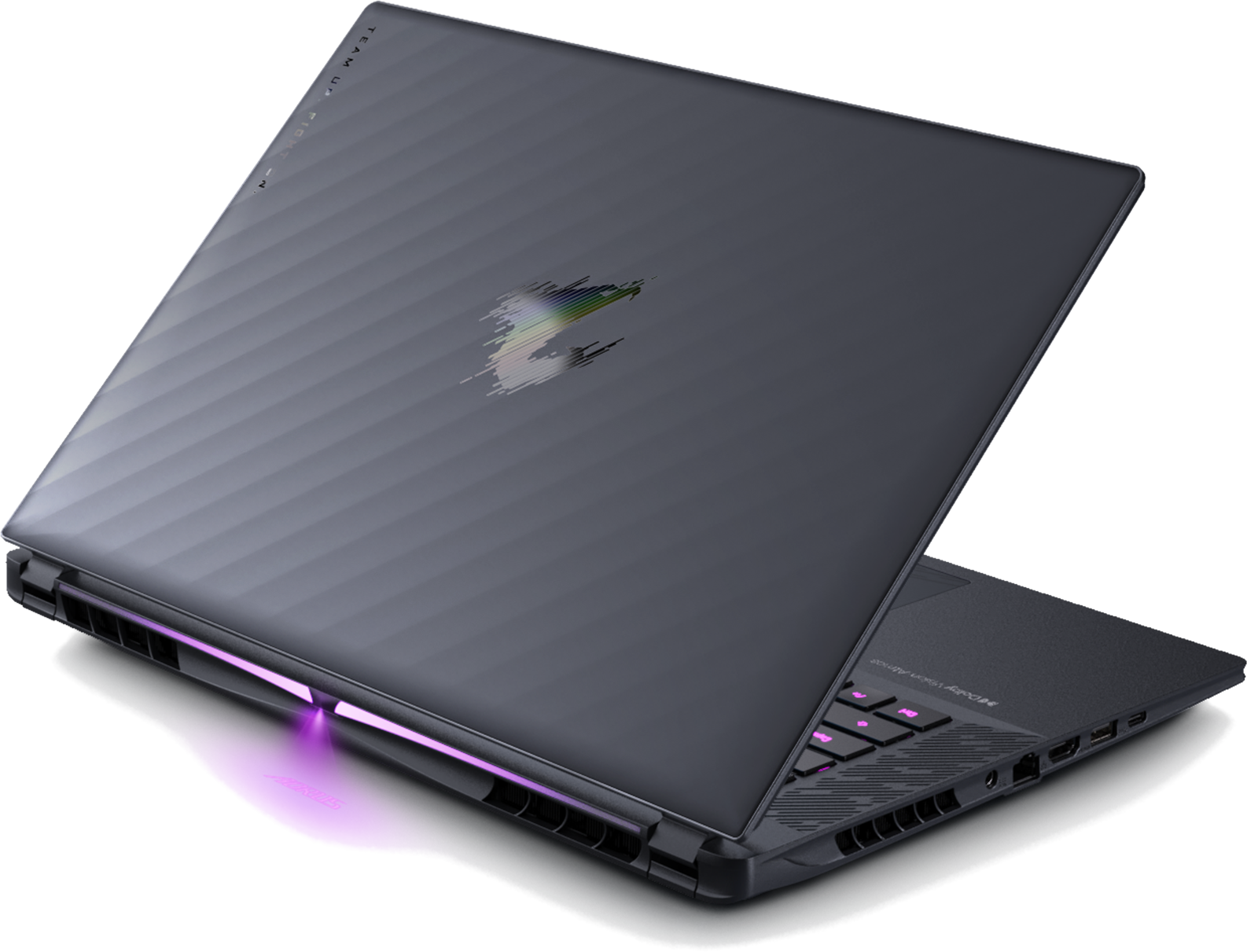 Un ordinateur portable fermé et sombre avec logo AORUS et éclairage RVB.