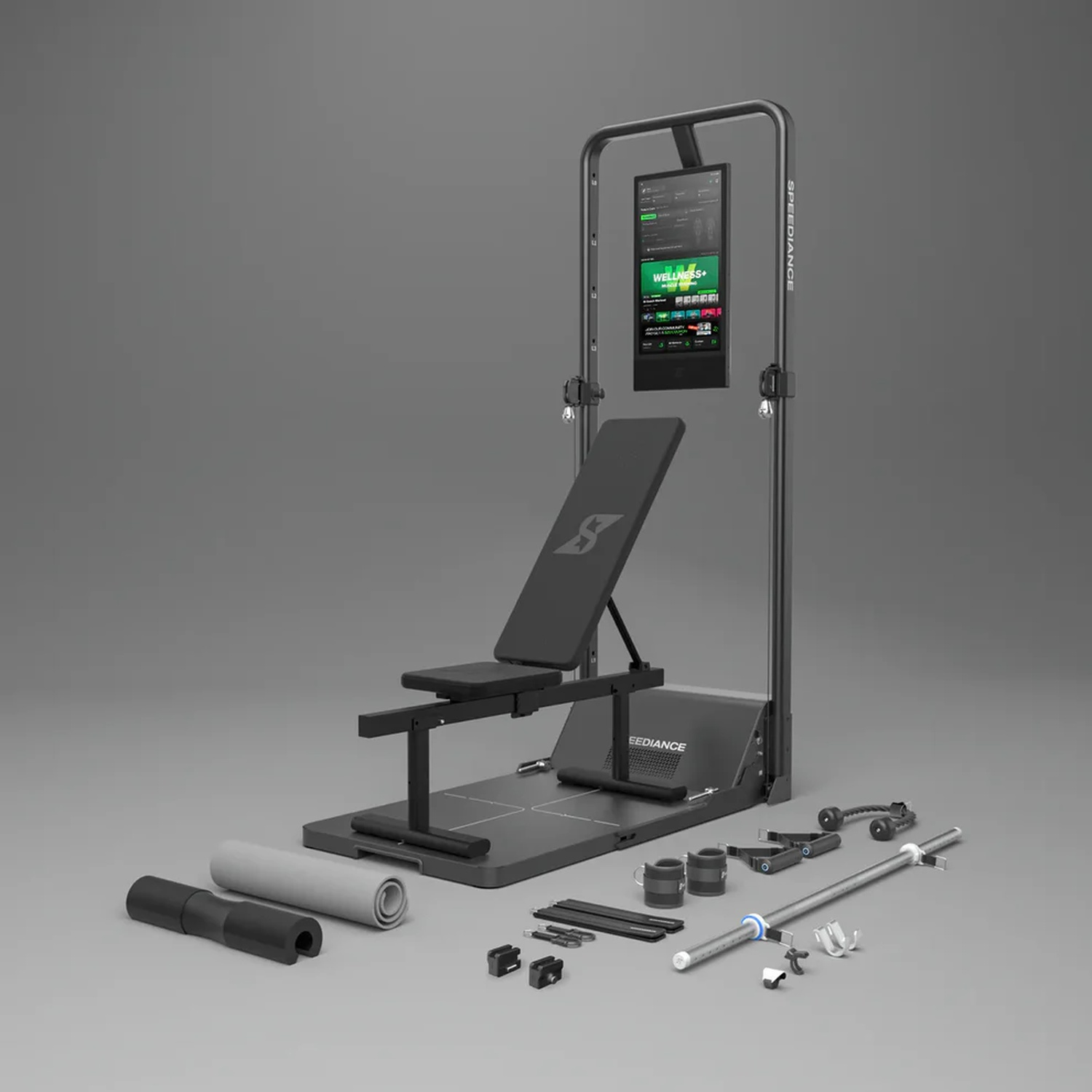 Una macchina fitness con panca, schermo e accessori su sfondo grigio.