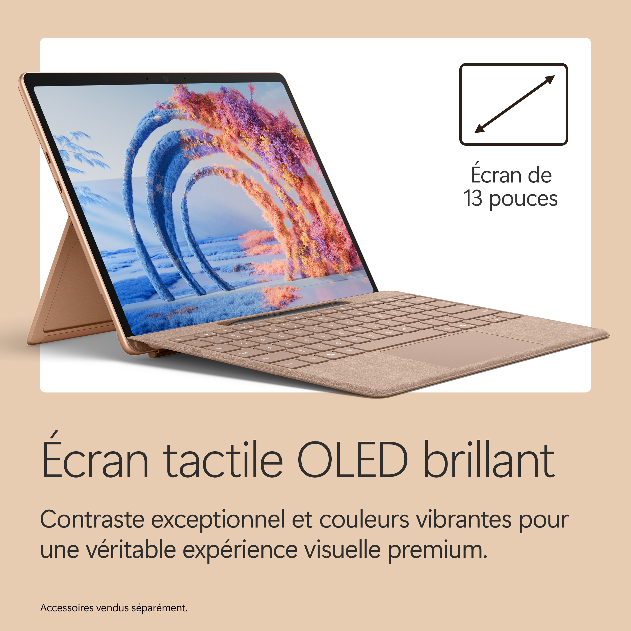 Un ordinateur portable doré avec écran tactile OLED de 13 pouces affichant une image vive.