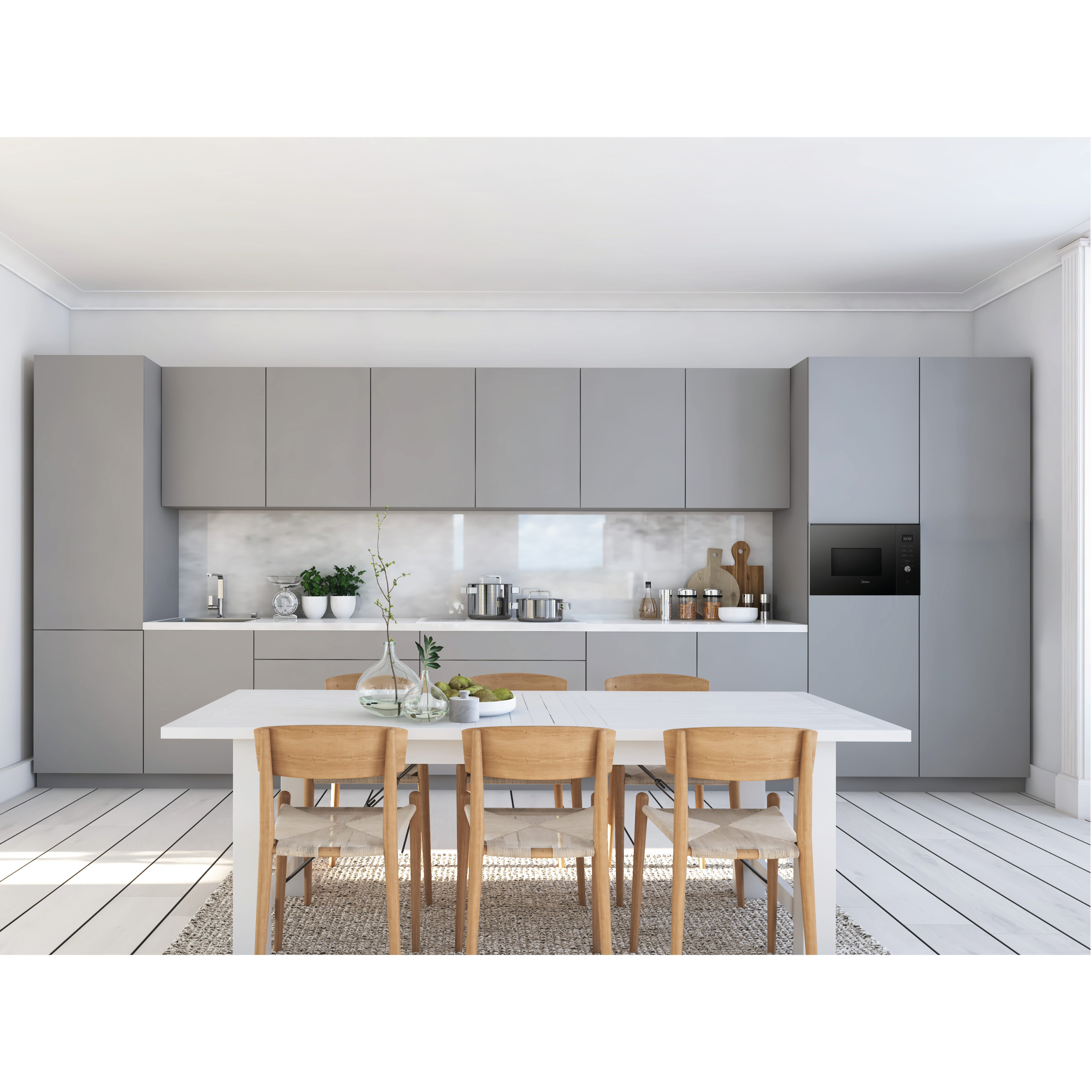 Cocina moderna con gabinetes grises, mesa blanca y sillas de madera.