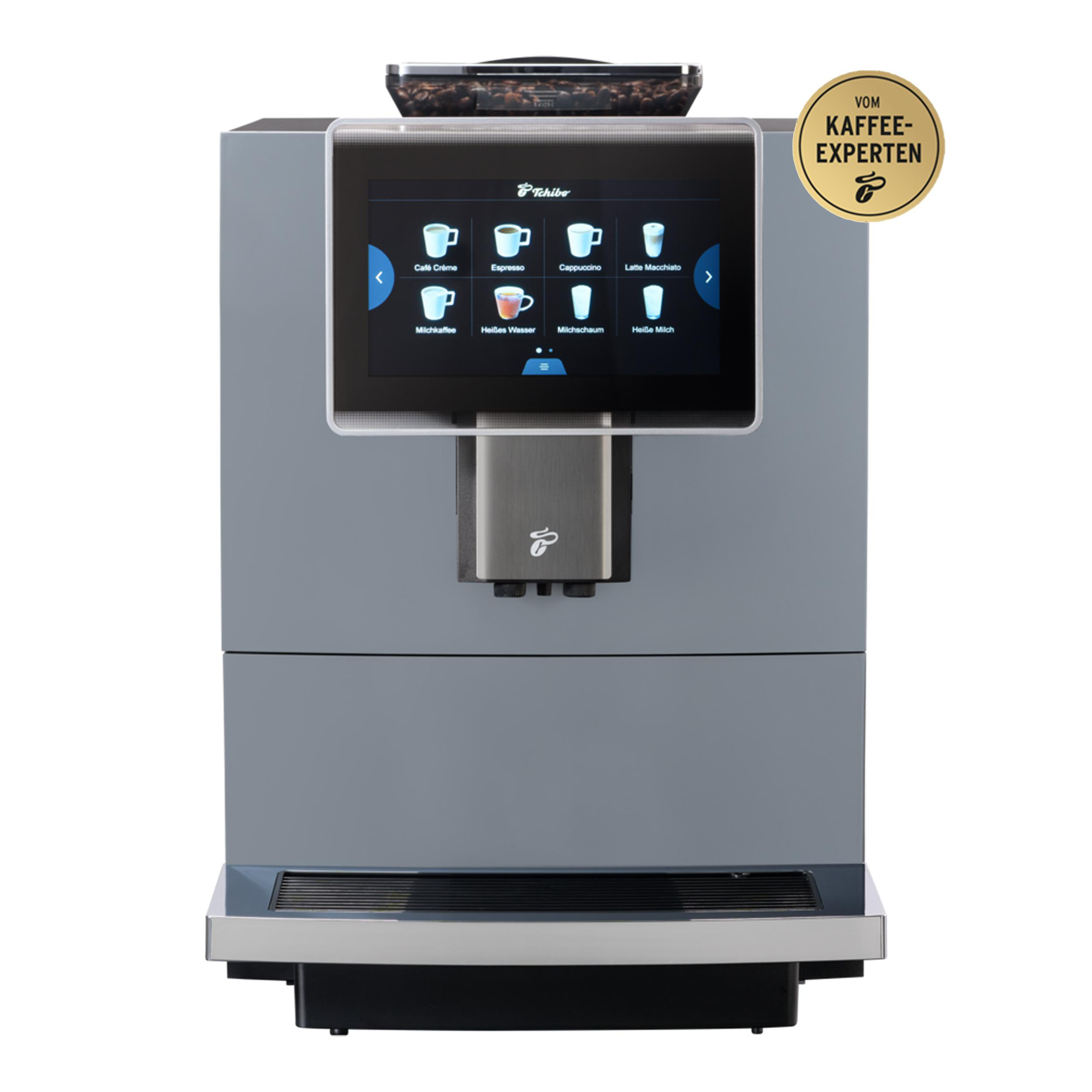 Graue Tchibo Kaffeemaschine mit Touchscreen und Bohnenbehälter.
