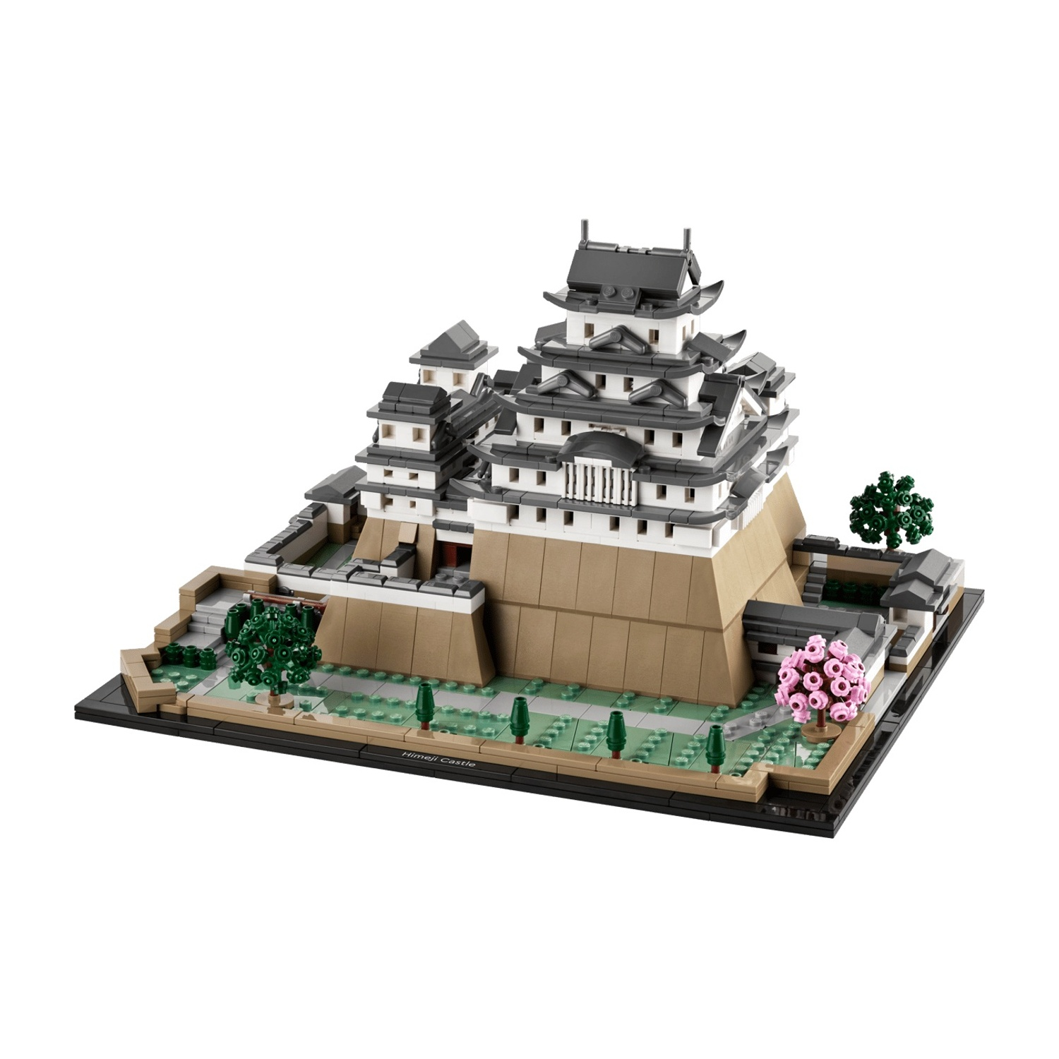 Modello Lego del castello di Himeji con alberi e fiori rosa su base nera.