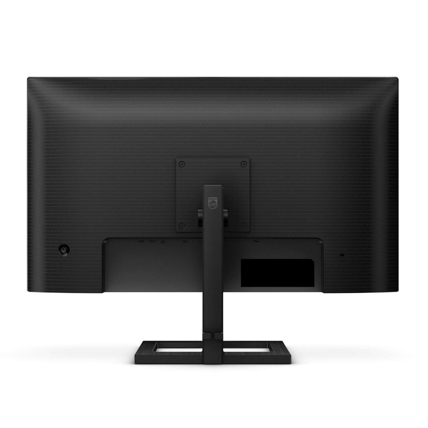 Vista posterior de un monitor negro con puertos como HDMI y USB.