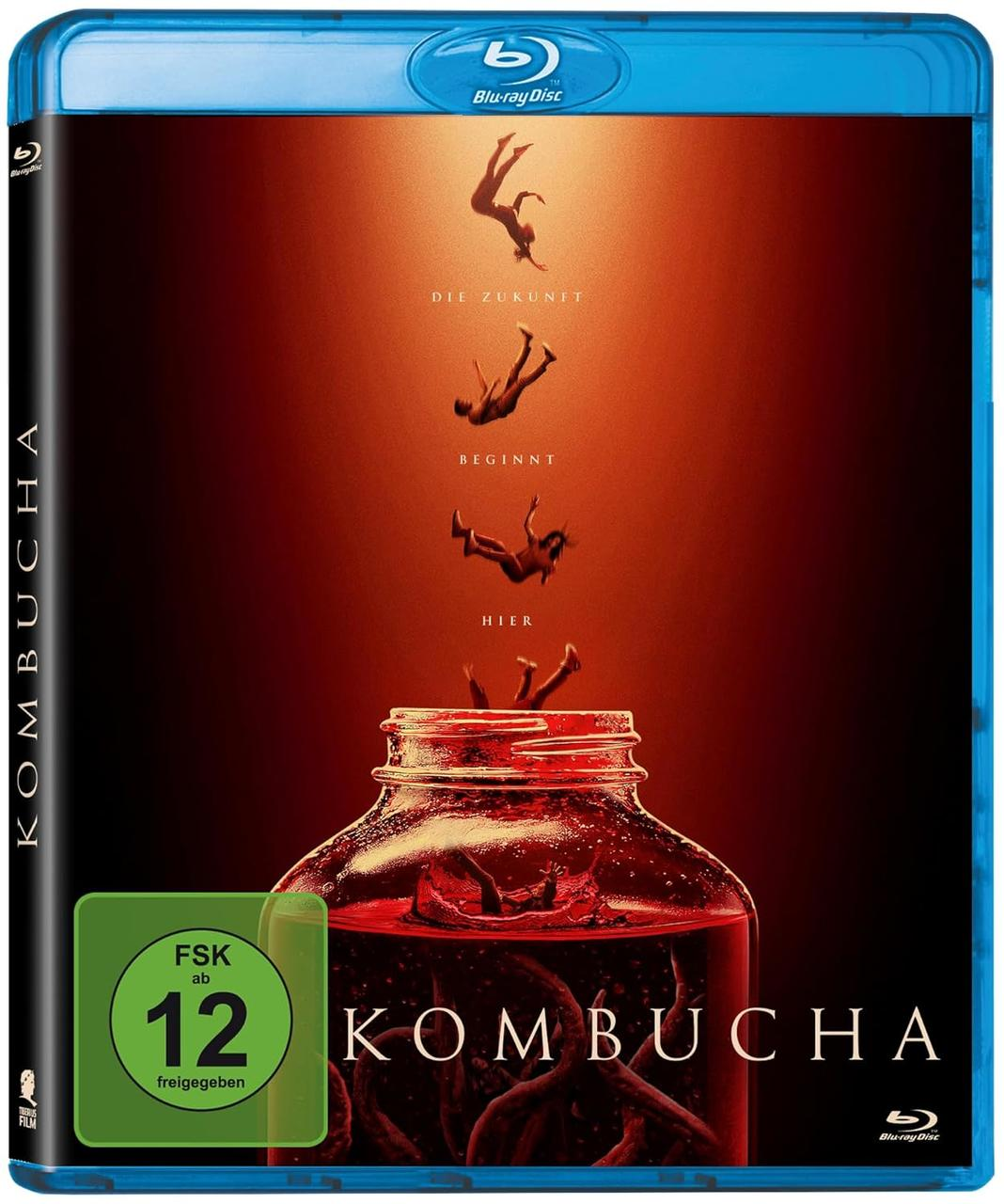 Kombucha Blu-ray Cover: Fallende Figuren über einem Glas mit roter Flüssigkeit.