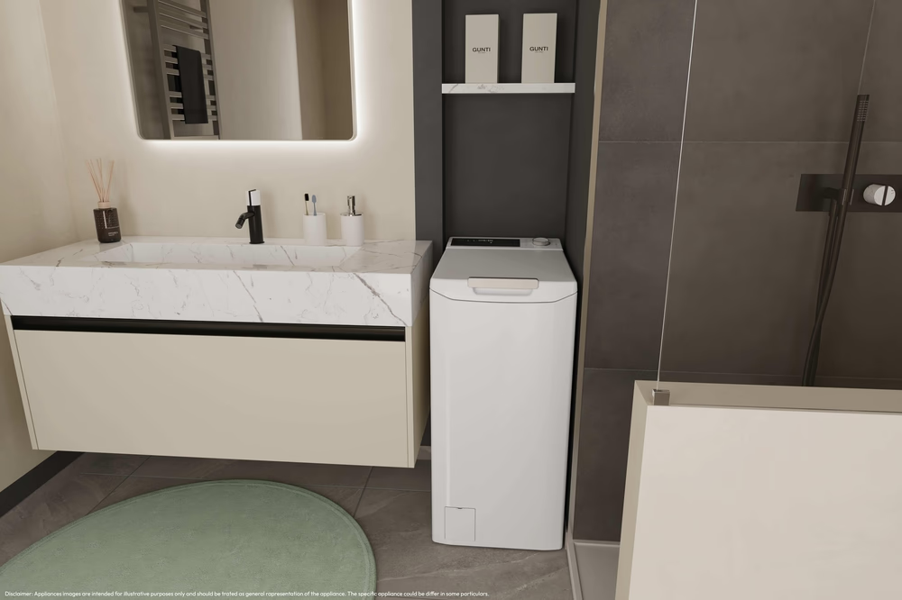 Une salle de bain moderne avec lavabo, miroir, machine à laver et douche.