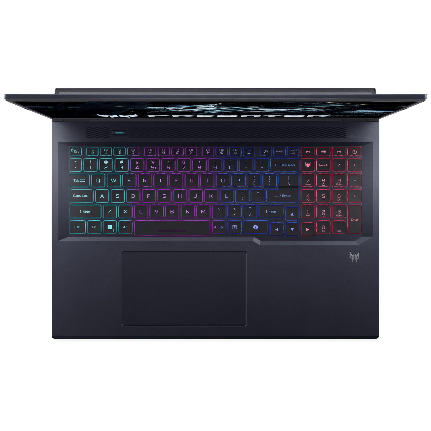 Un ordinateur portable sombre avec clavier rétroéclairé, gros plan, vu de dessus.