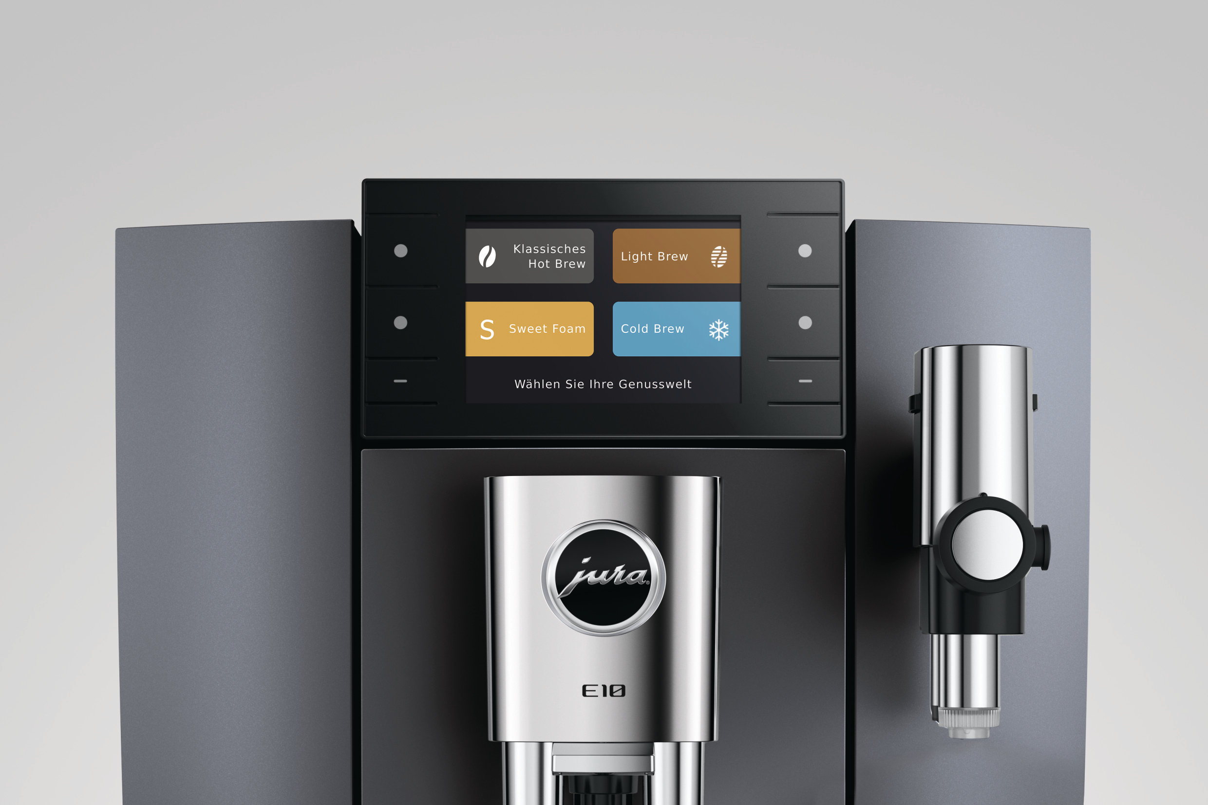 Eine silberne Kaffeemaschine mit Touchscreen-Menü für verschiedene Kaffeegetränke.