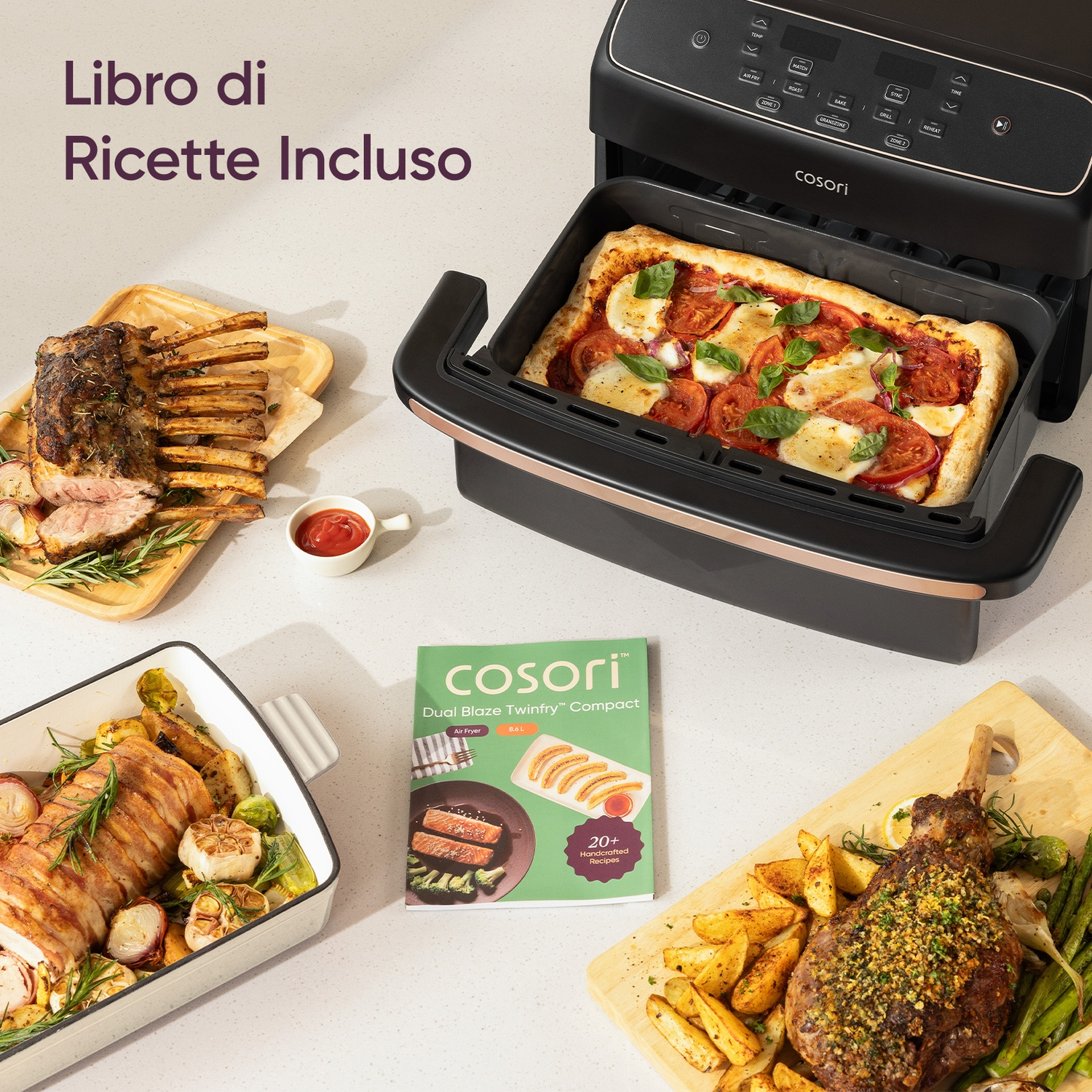 Un set di friggitrice ad aria Cosori con vari piatti di carne e un libro di ricette.