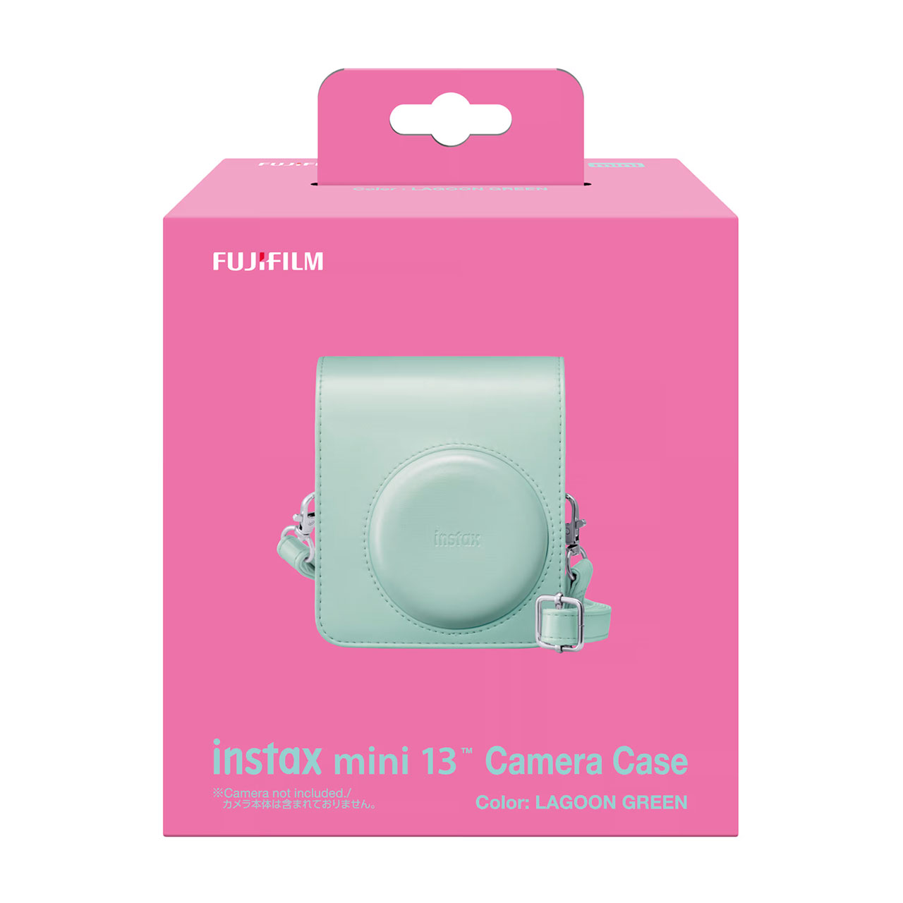 Un estuche verde pastel para cámara Instax Mini 13 en caja rosa.